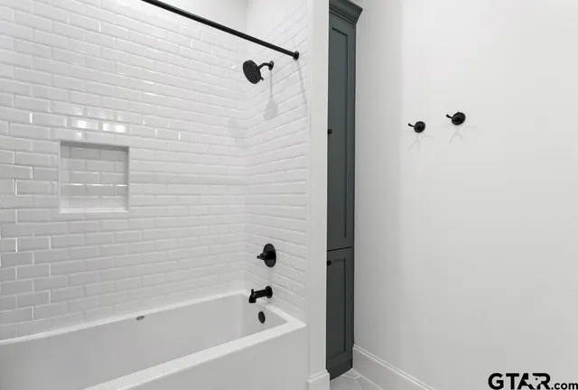 a bathroom with a bathtub