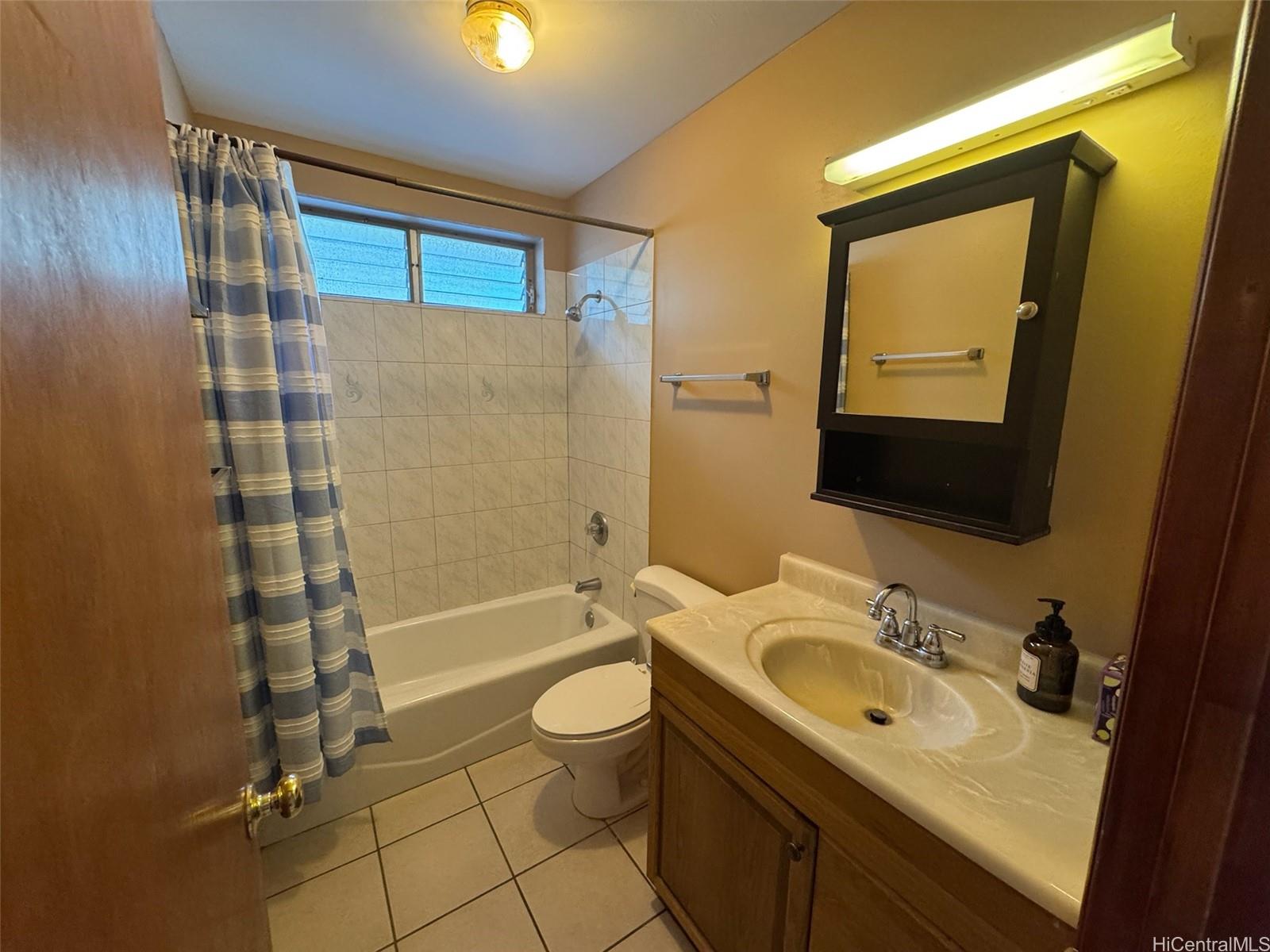 541 Kuliouou Road Honolulu, HI 96821 - Photo 19 of 21 a bathroom with a sink toilet and shower