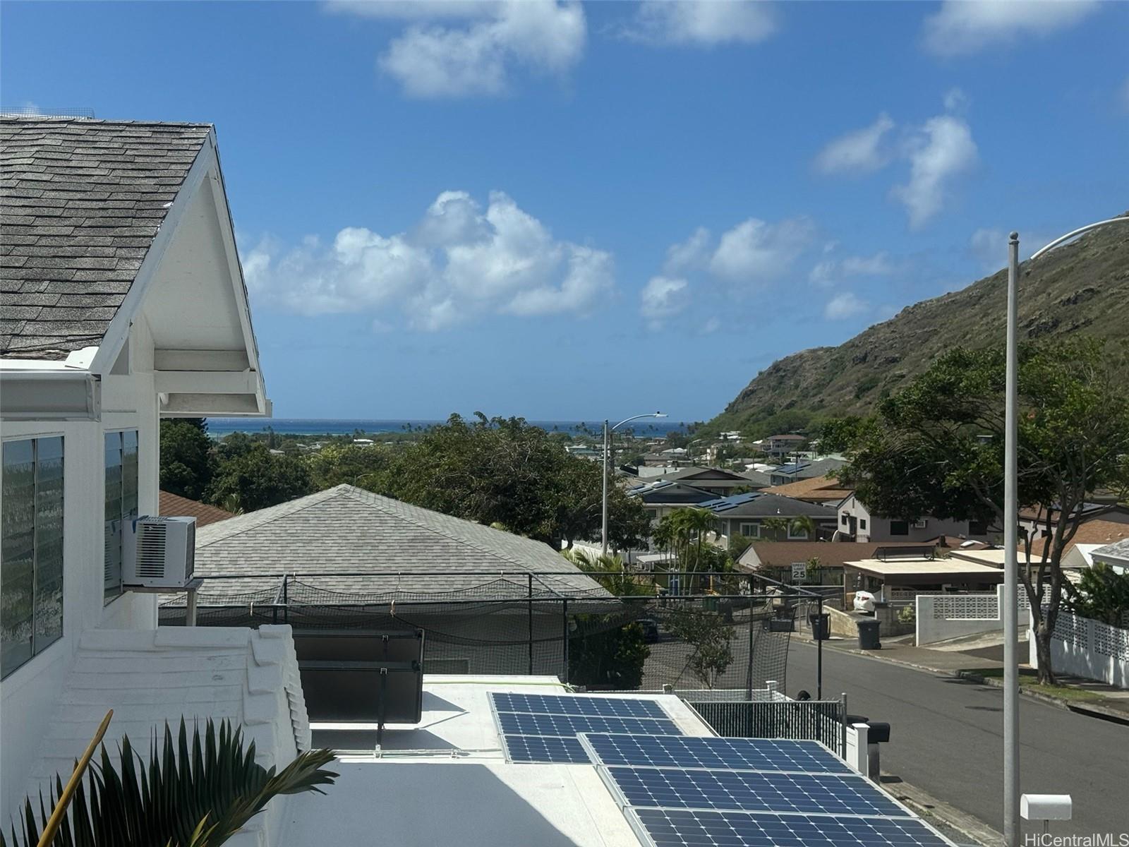 541 Kuliouou Road Honolulu, HI 96821 - Photo 3 of 21 a aerial view of a house with a yard and balcony