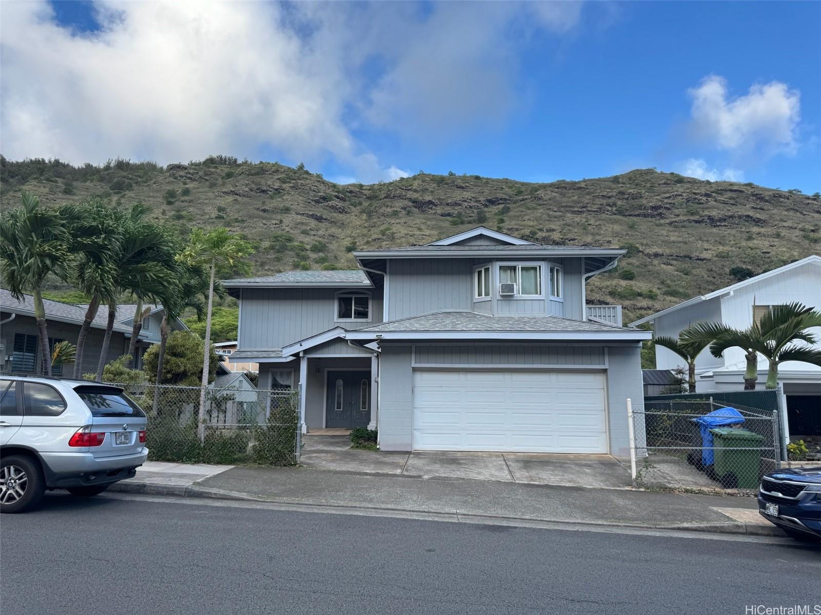 541 Kuliouou Road Honolulu, HI 96821 - Photo 5 of 21 a view of multiple houses with a city street