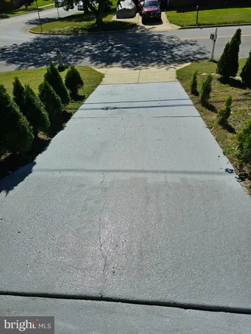 a view of yard with swimming pool