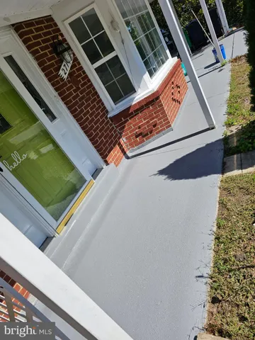 a view of backyard with wooden floor