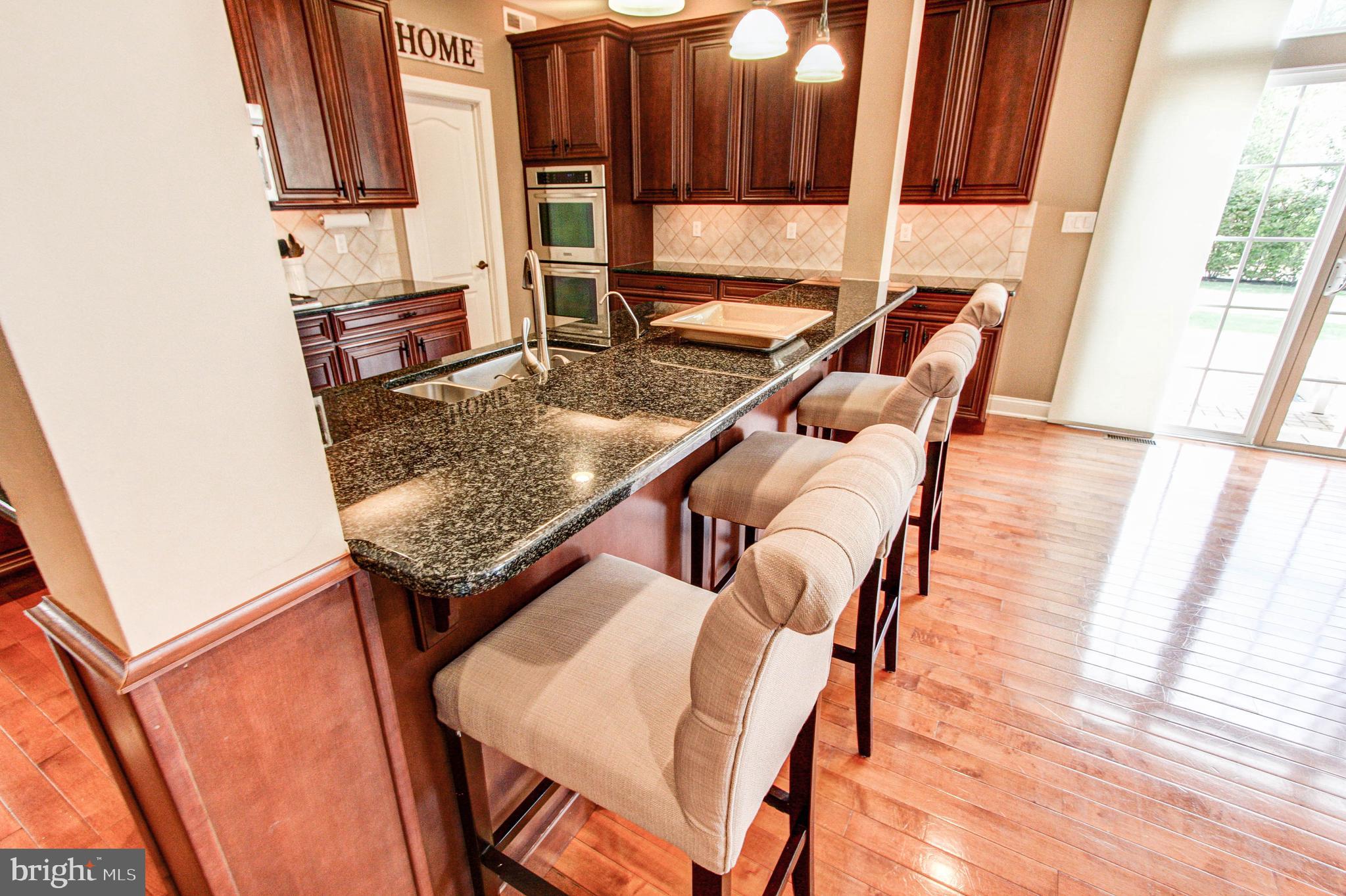 2196 Glenridge Road Furlong, PA 18925 - Photo 20 of 42 Raised Kitchen Island Bar with Granite Countertops