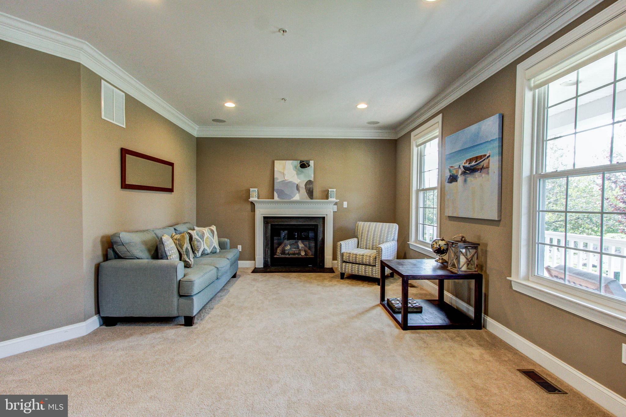 2196 Glenridge Road Furlong, PA 18925 - Photo 7 of 42 Living Room with Gas Fireplace