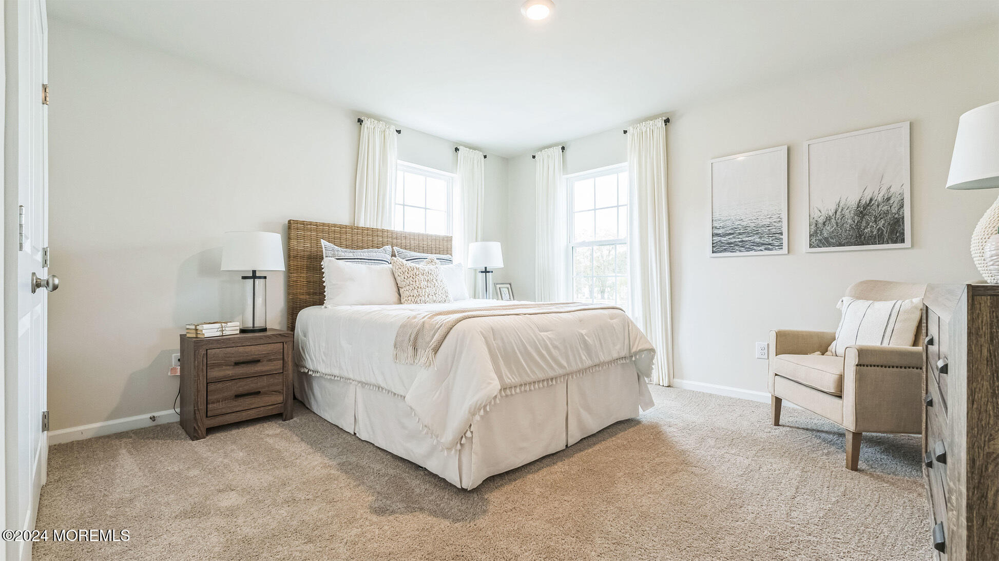 67 Penny Lane Neptune Township, NJ 07753 - Photo 27 of 29 a bedroom with a bed and a chair