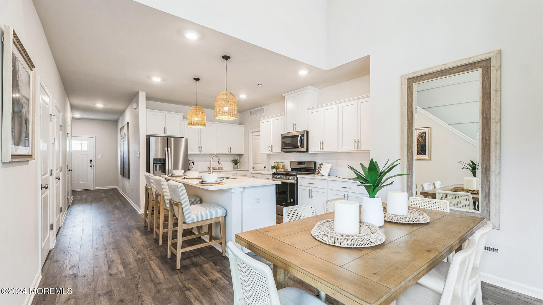 67 Penny Lane Neptune Township, NJ 07753 - Photo 4 of 29 a kitchen with a table and chairs in it