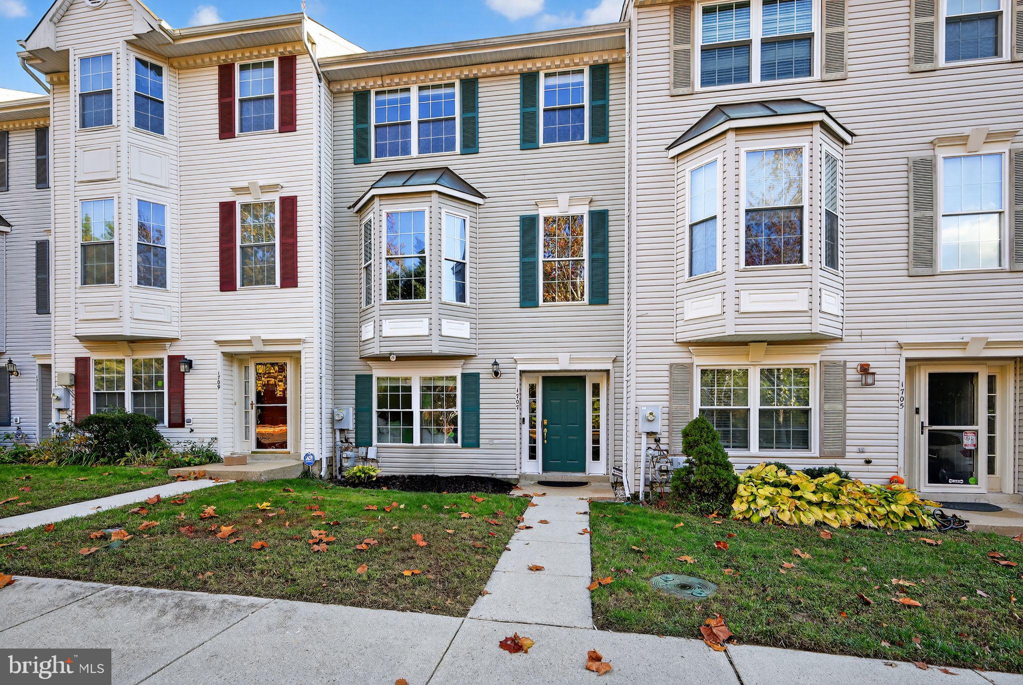 1707 Severn Tree Court Severn, MD 21144 - Photo 1 of 37 a front view of a house with garden and porch