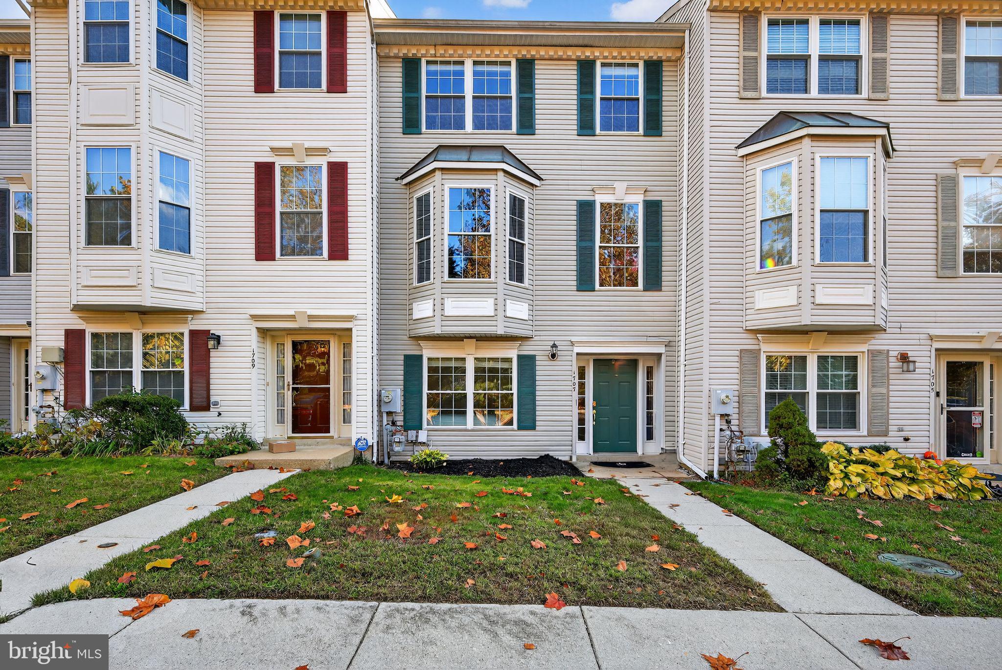 1707 Severn Tree Court Severn, MD 21144 - Photo 2 of 37 front view of a brick house with a yard