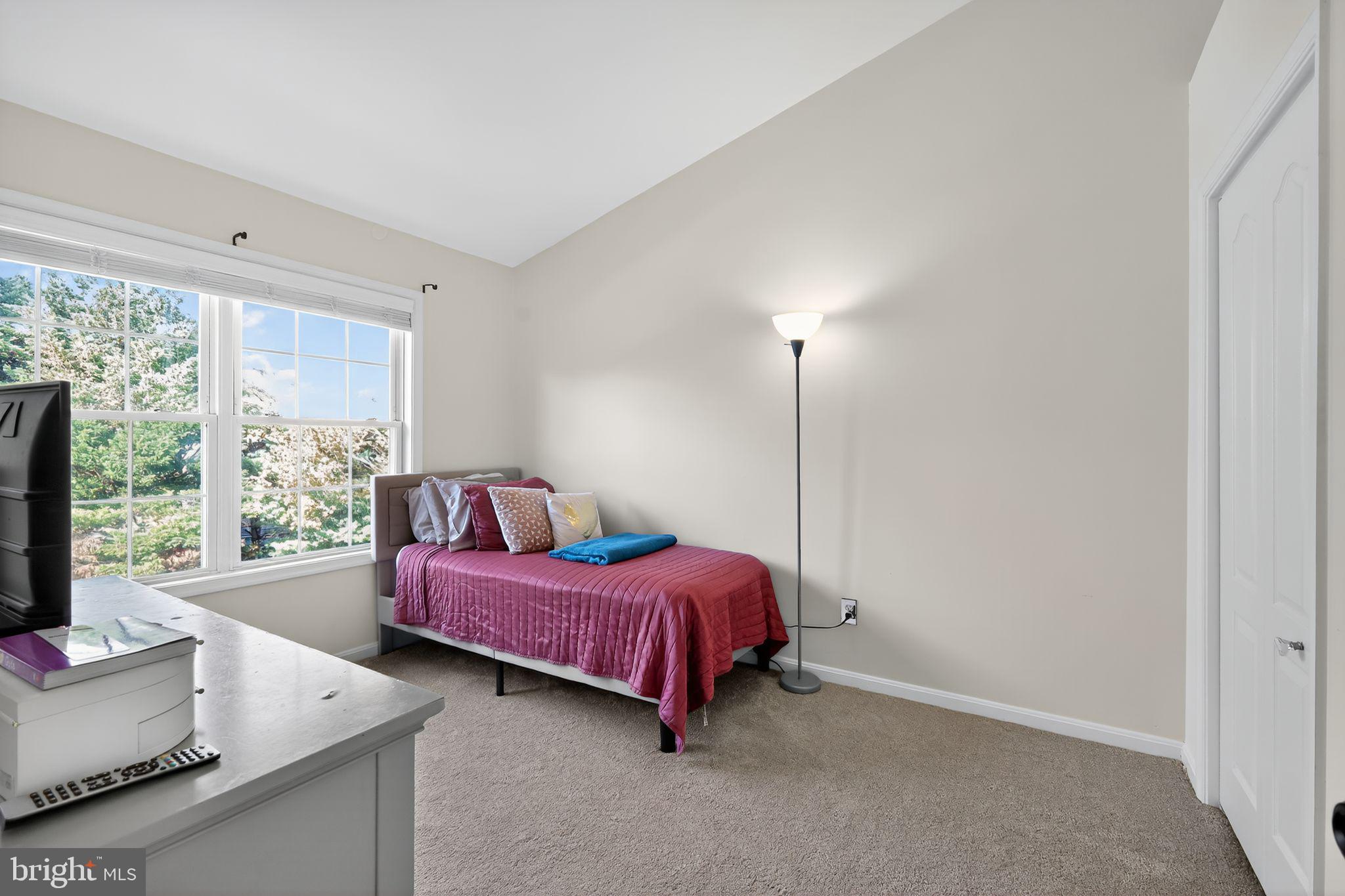 1707 Severn Tree Court Severn, MD 21144 - Photo 24 of 37 a living room with furniture and a flat screen tv