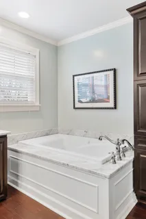 a bathroom with a sink and a bathtub