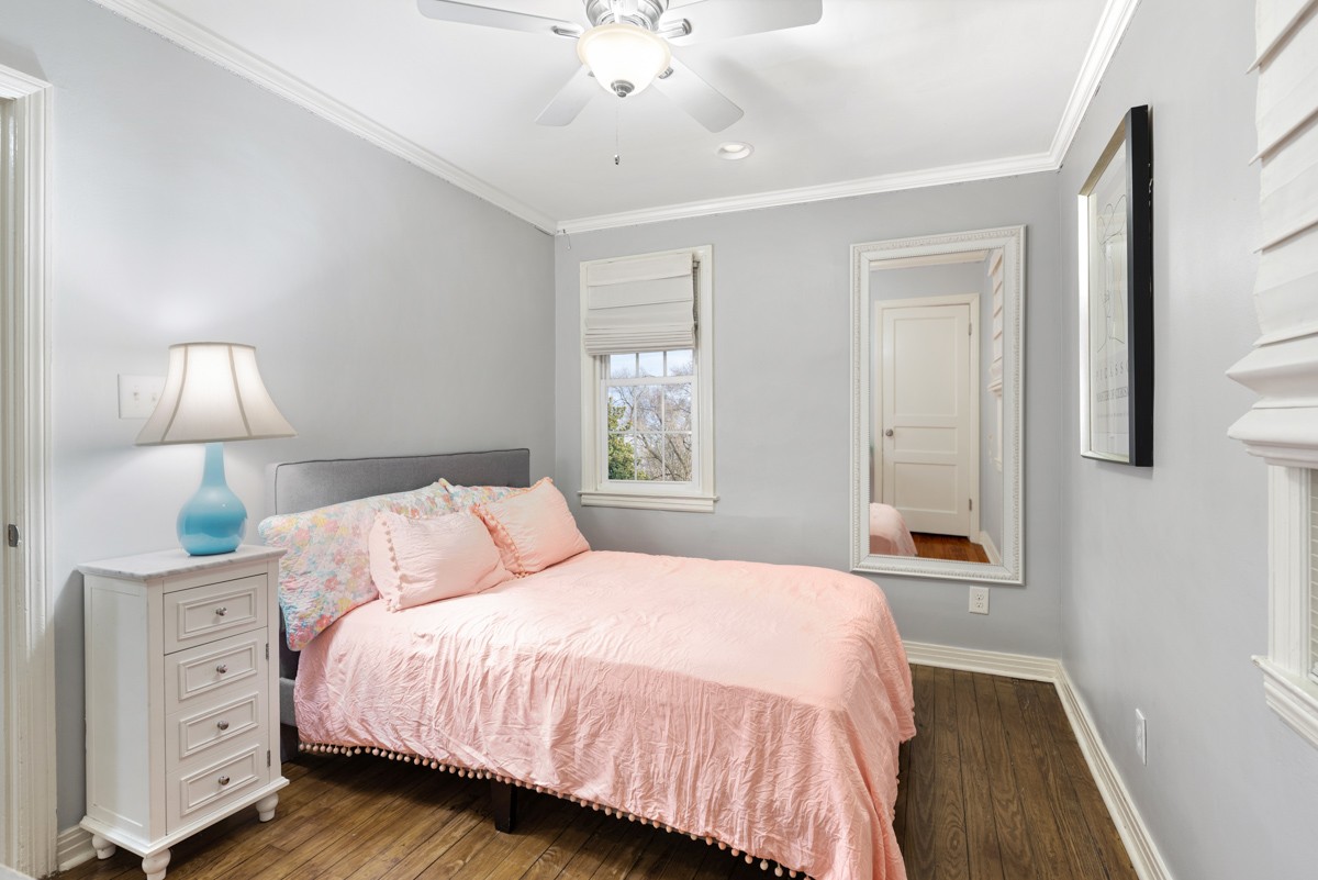 1002 Sutton Hill Road Nashville, TN 37204 - Photo 21 of 40 a bedroom with a bed and a window