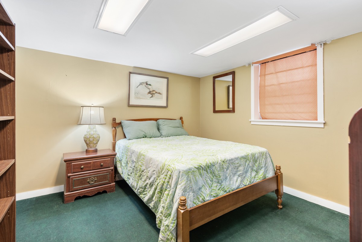 1002 Sutton Hill Road Nashville, TN 37204 - Photo 31 of 40 a bedroom with a bed and a window