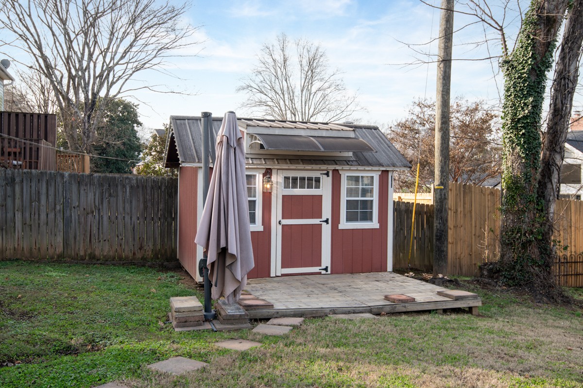 1002 Sutton Hill Road Nashville, TN 37204 - Photo 36 of 40 a front view of a house with garden
