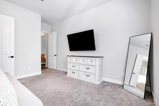 wooden floor and flat screen tv