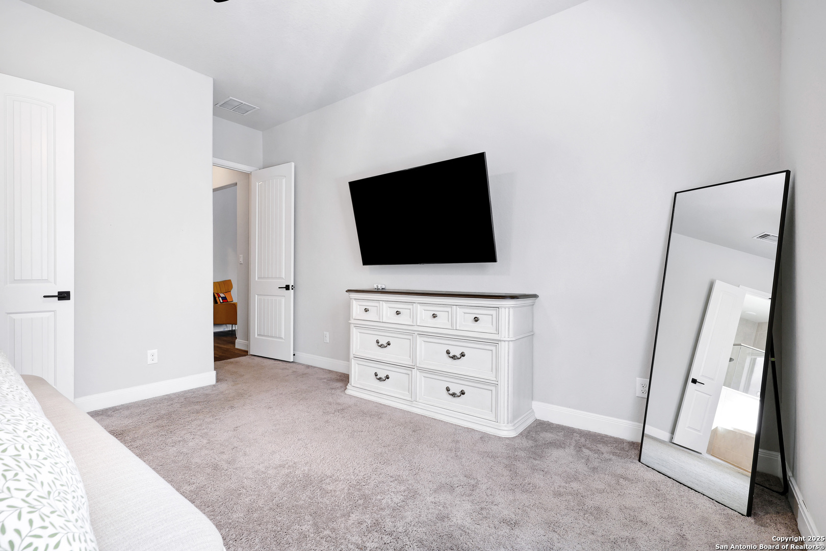 110 Giverny Boerne, TX 78006 - Photo 15 of 31 wooden floor and flat screen tv