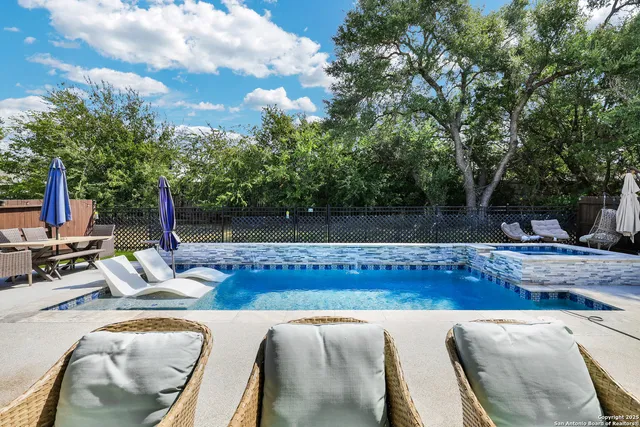 a view of outdoor sitting area with furniture