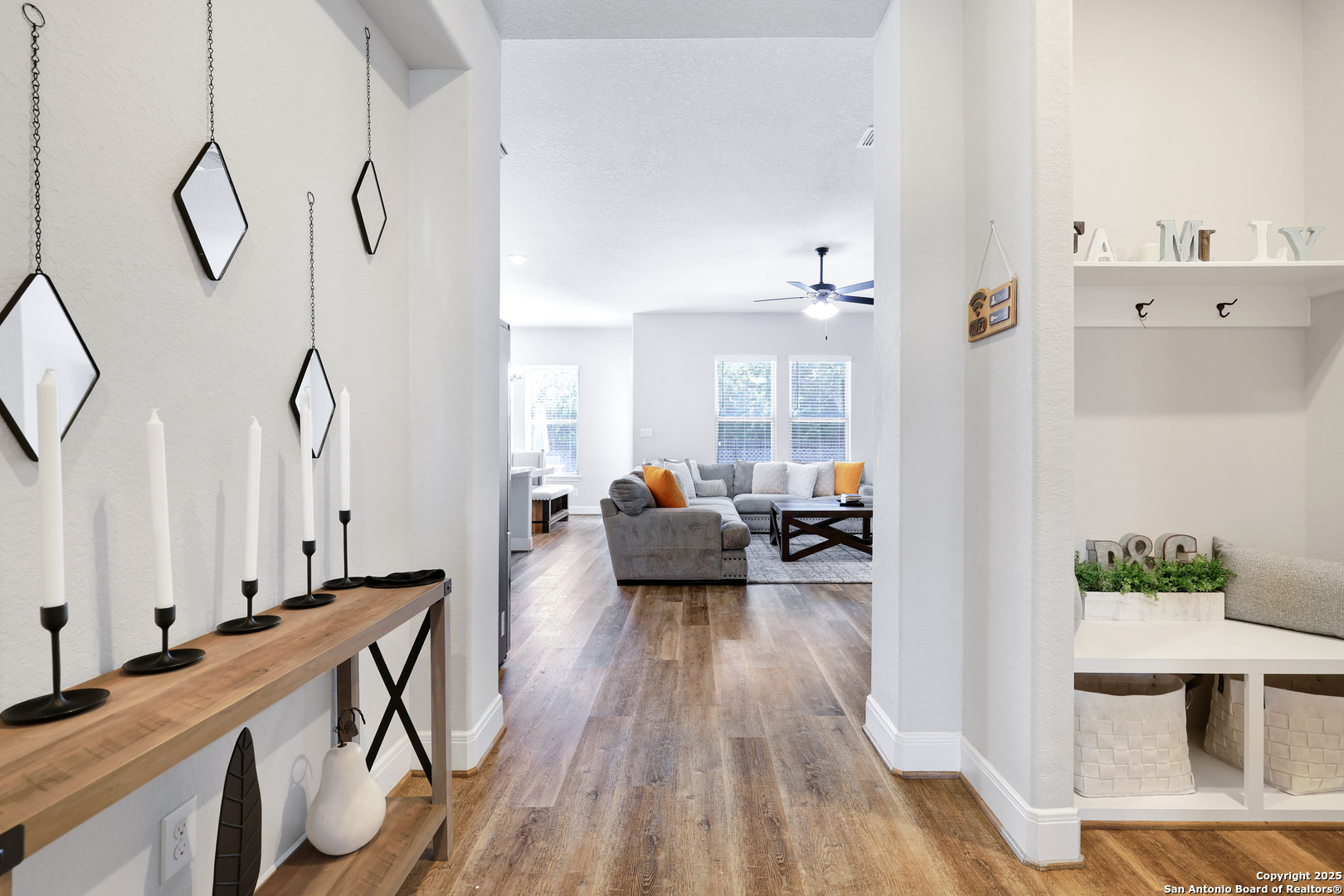 110 Giverny Boerne, TX 78006 - Photo 4 of 31 a living room with furniture and a wooden floor