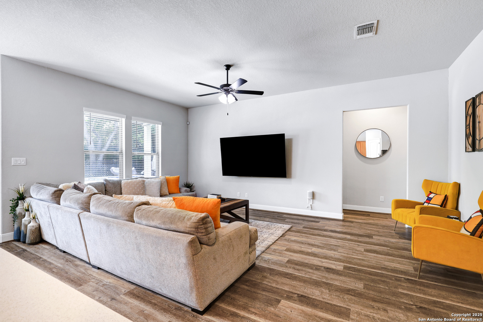 110 Giverny Boerne, TX 78006 - Photo 6 of 31 a living room with furniture and a flat screen tv