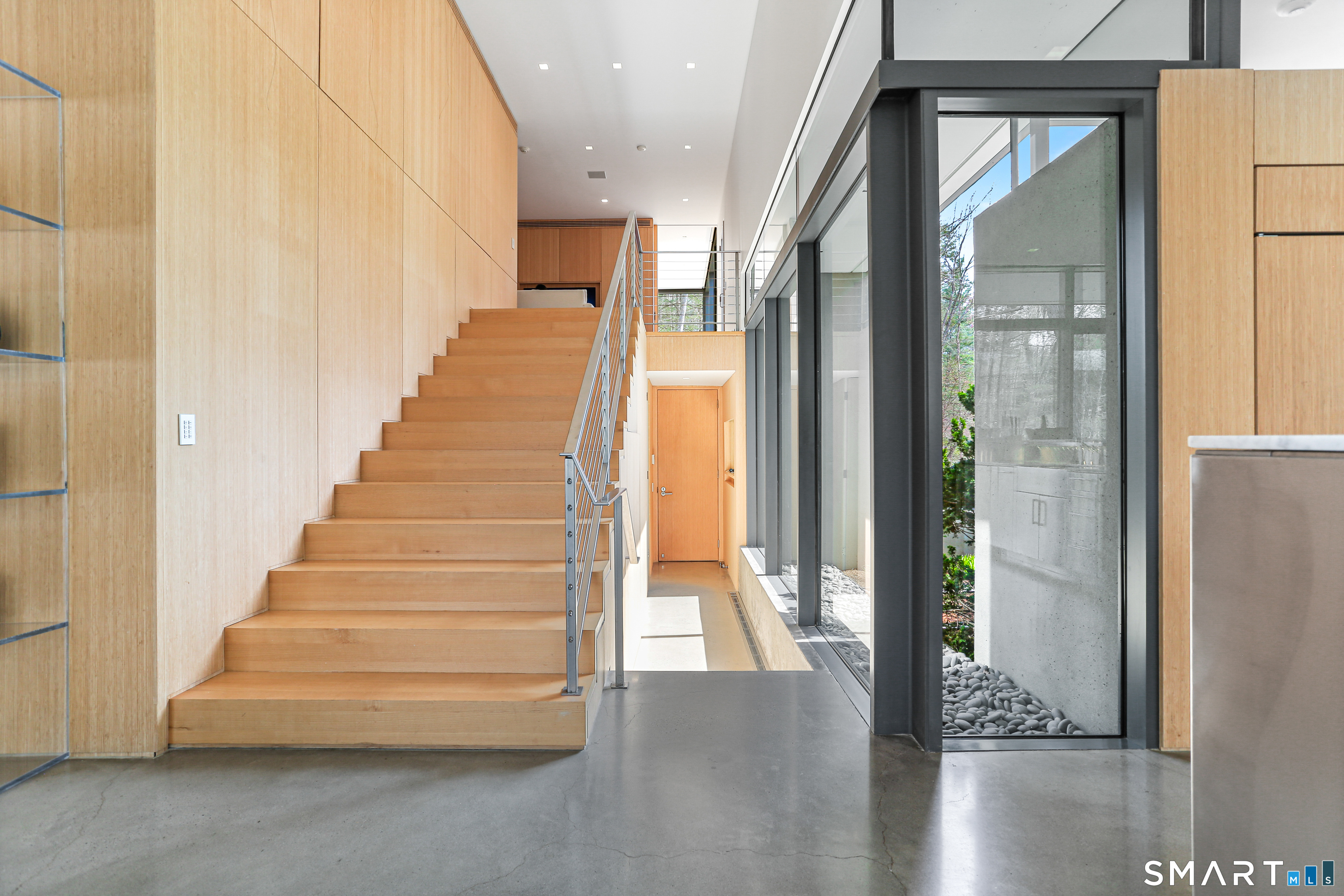 52 Valley Forge Road Weston, CT 06883 - Photo 20 of 38 a view of entryway and hall with wooden floor