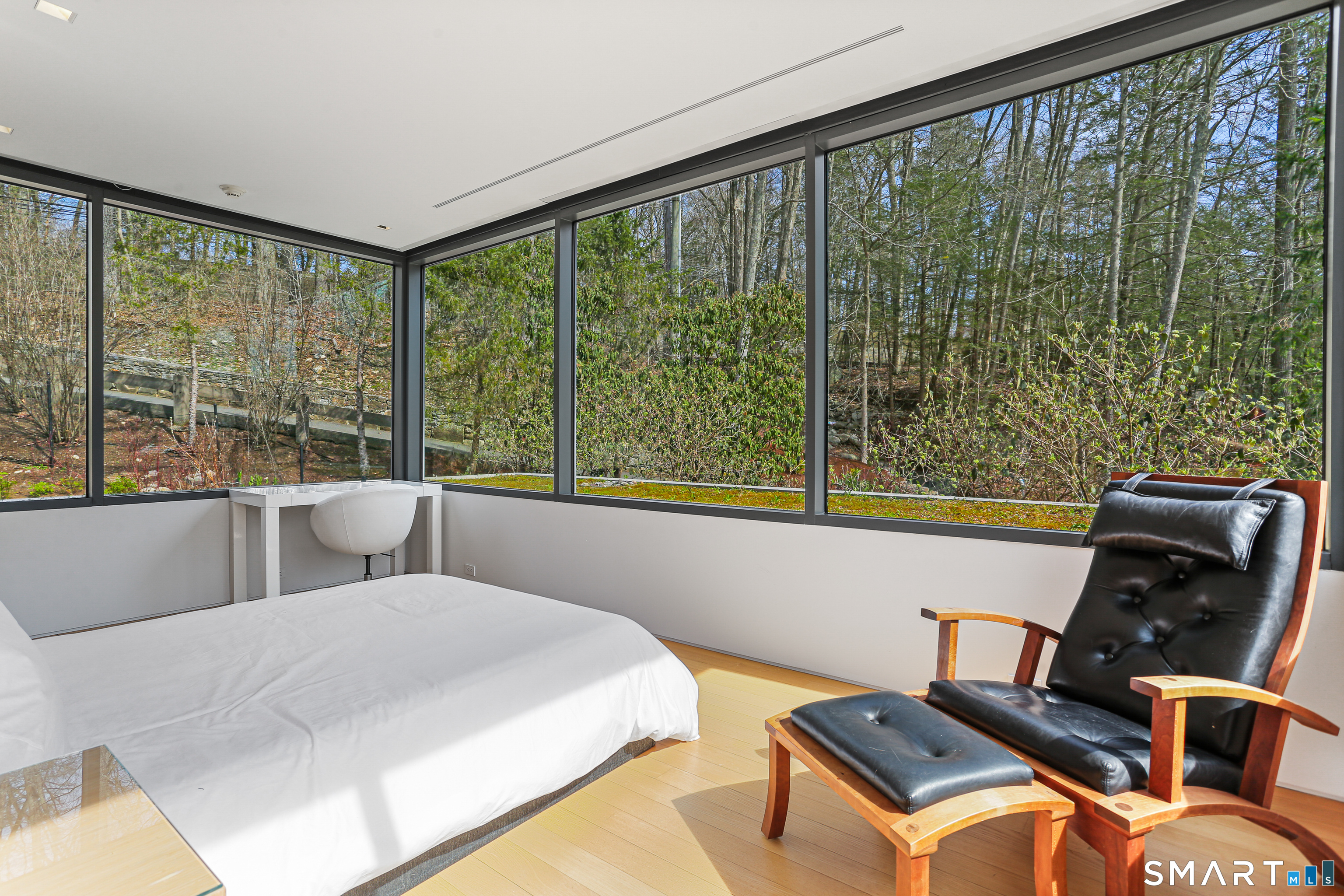 52 Valley Forge Road Weston, CT 06883 - Photo 23 of 38 a bedroom with furniture and a large window