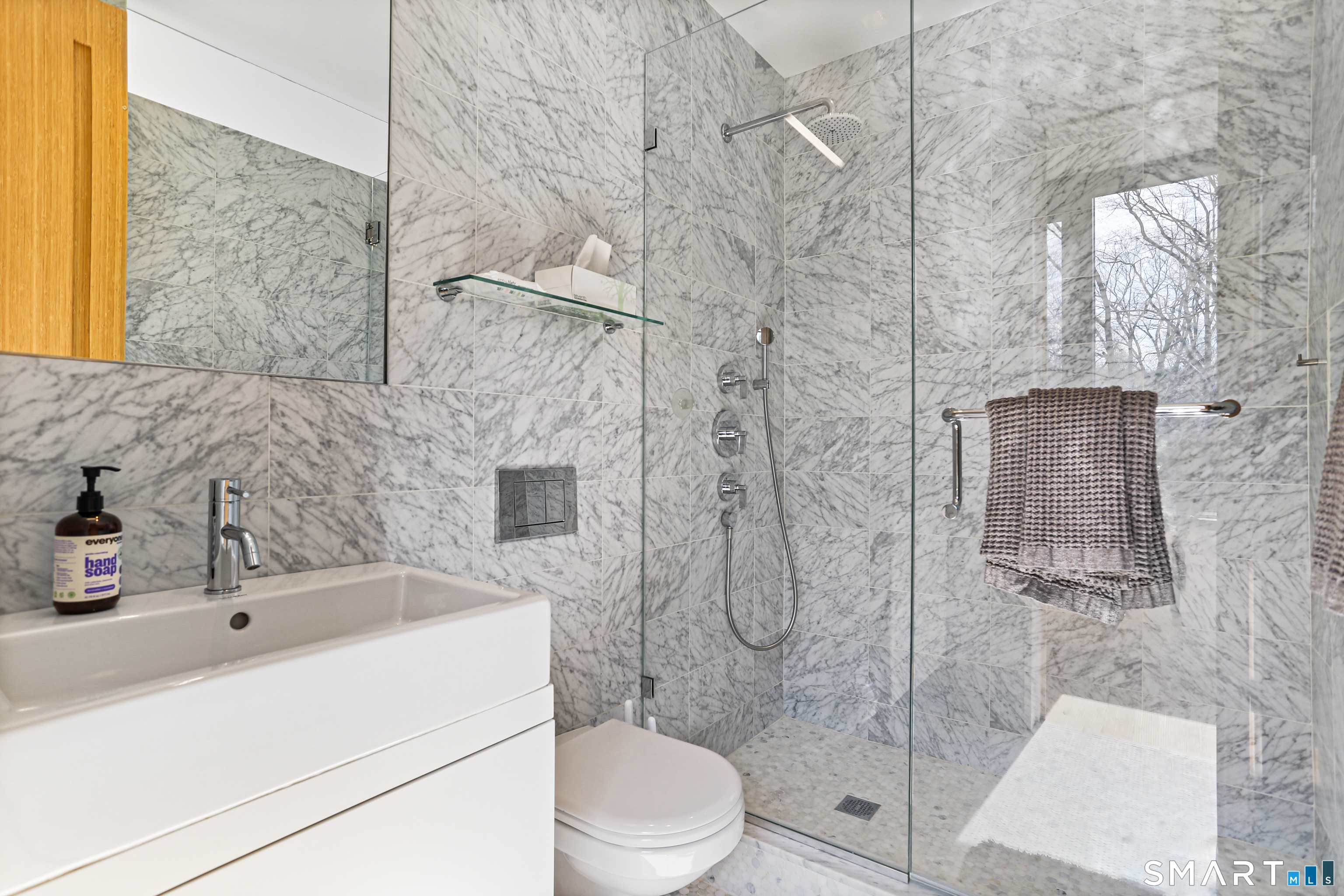 52 Valley Forge Road Weston, CT 06883 - Photo 25 of 38 a bathroom with a sink toilet and shower