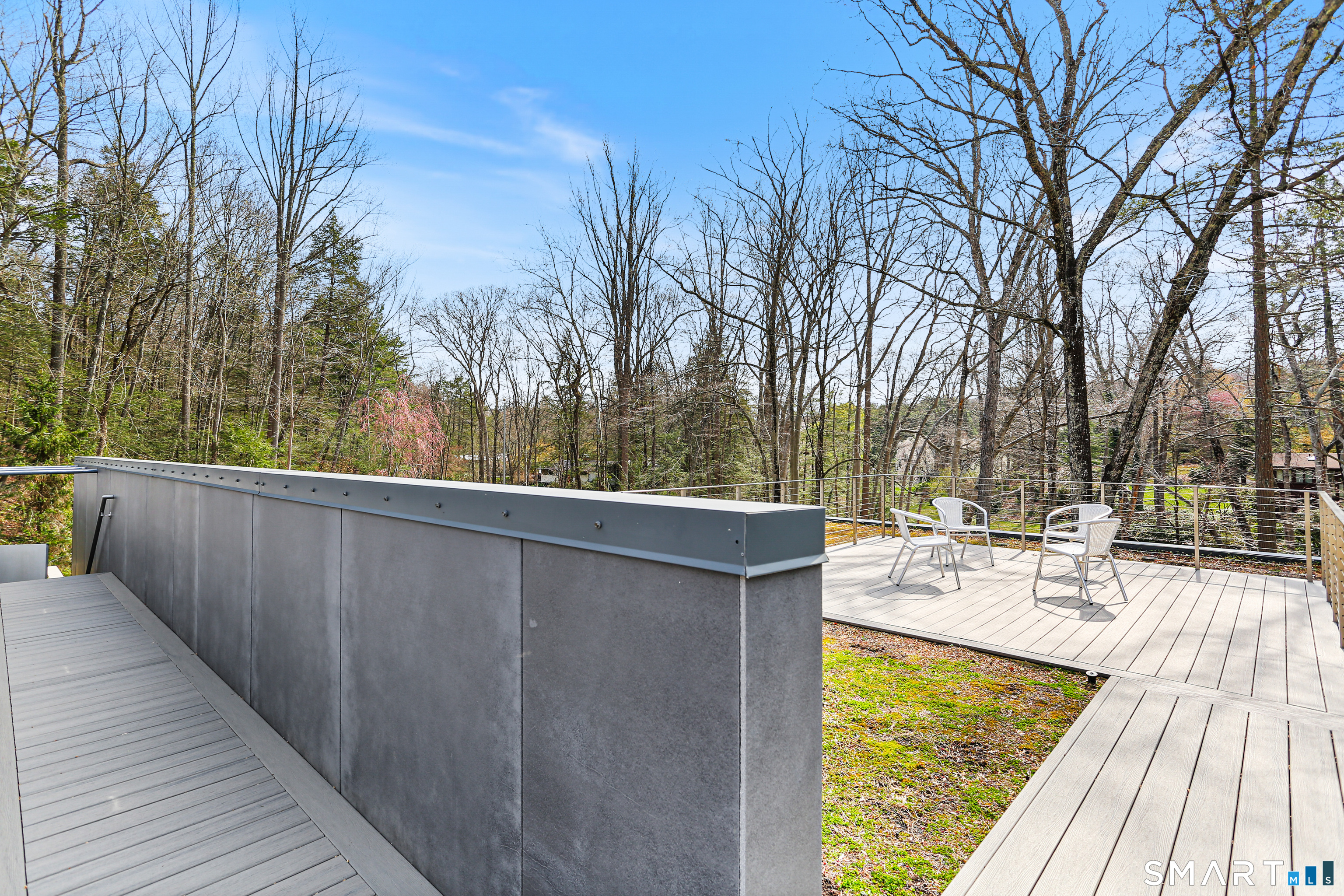 52 Valley Forge Road Weston, CT 06883 - Photo 26 of 38 a view of balcony with wooden floor and outdoor seating