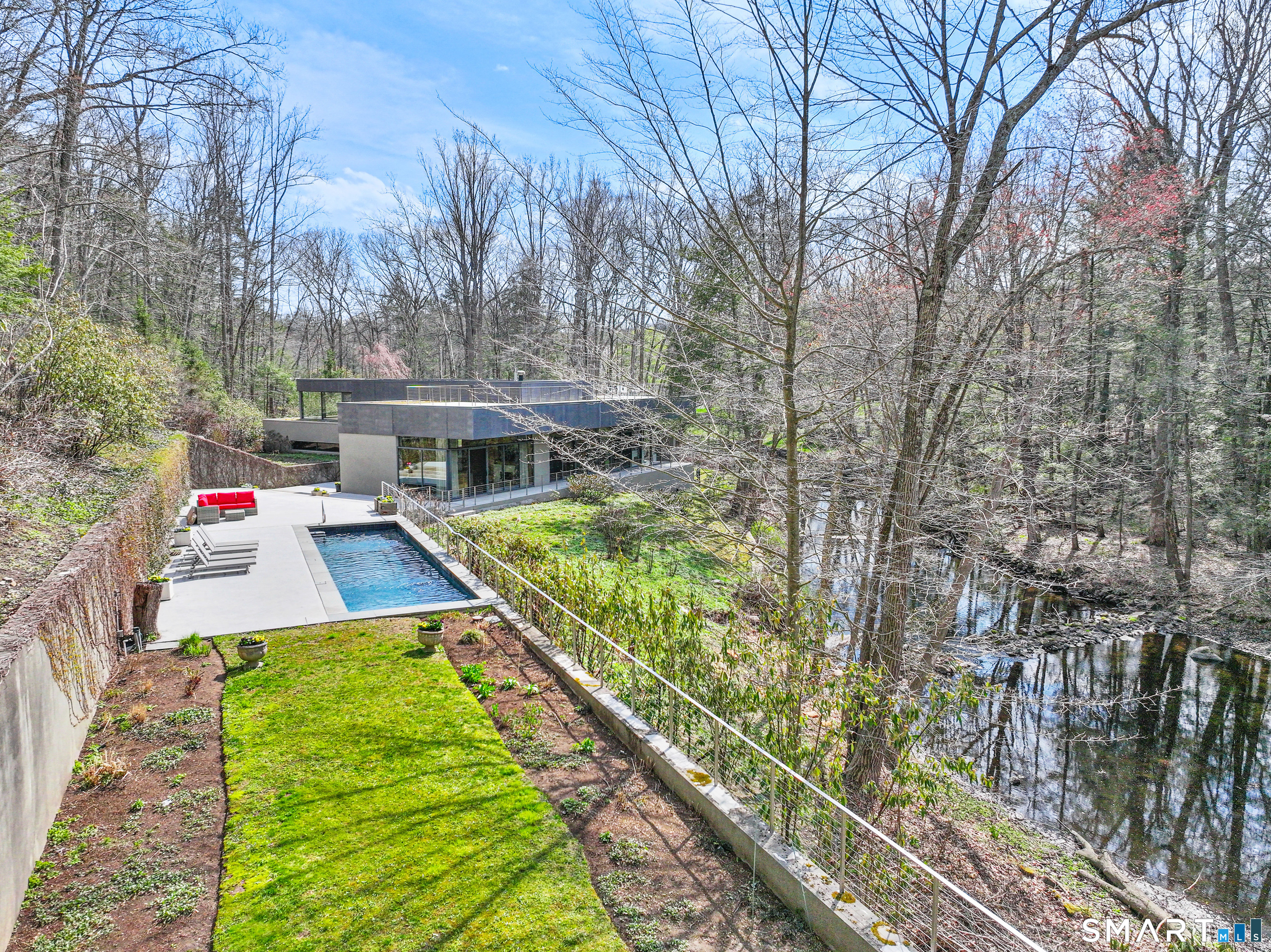 52 Valley Forge Road Weston, CT 06883 - Photo 3 of 38 a front view of house with yard