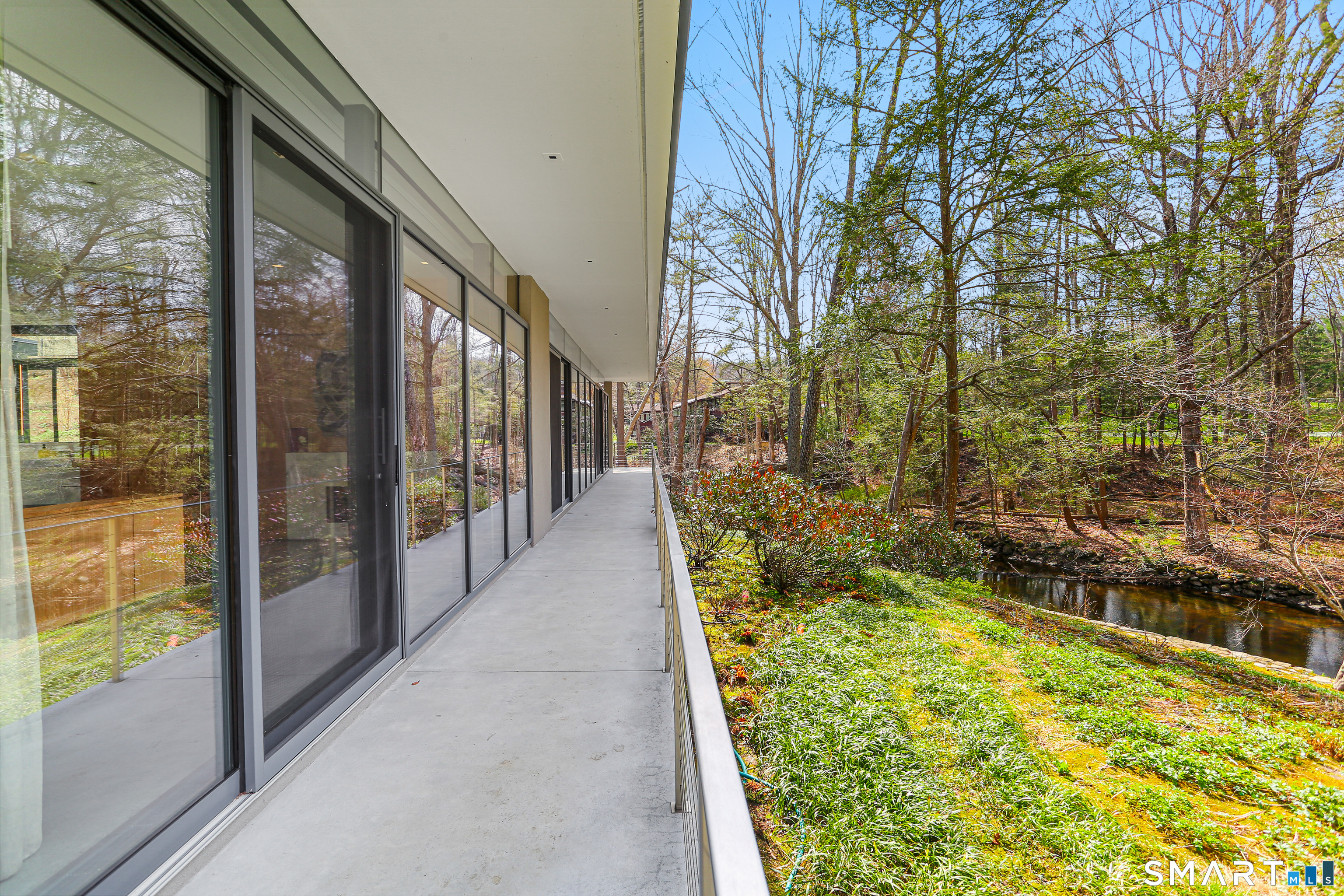 52 Valley Forge Road Weston, CT 06883 - Photo 31 of 38 a view of a pathway both side of yard
