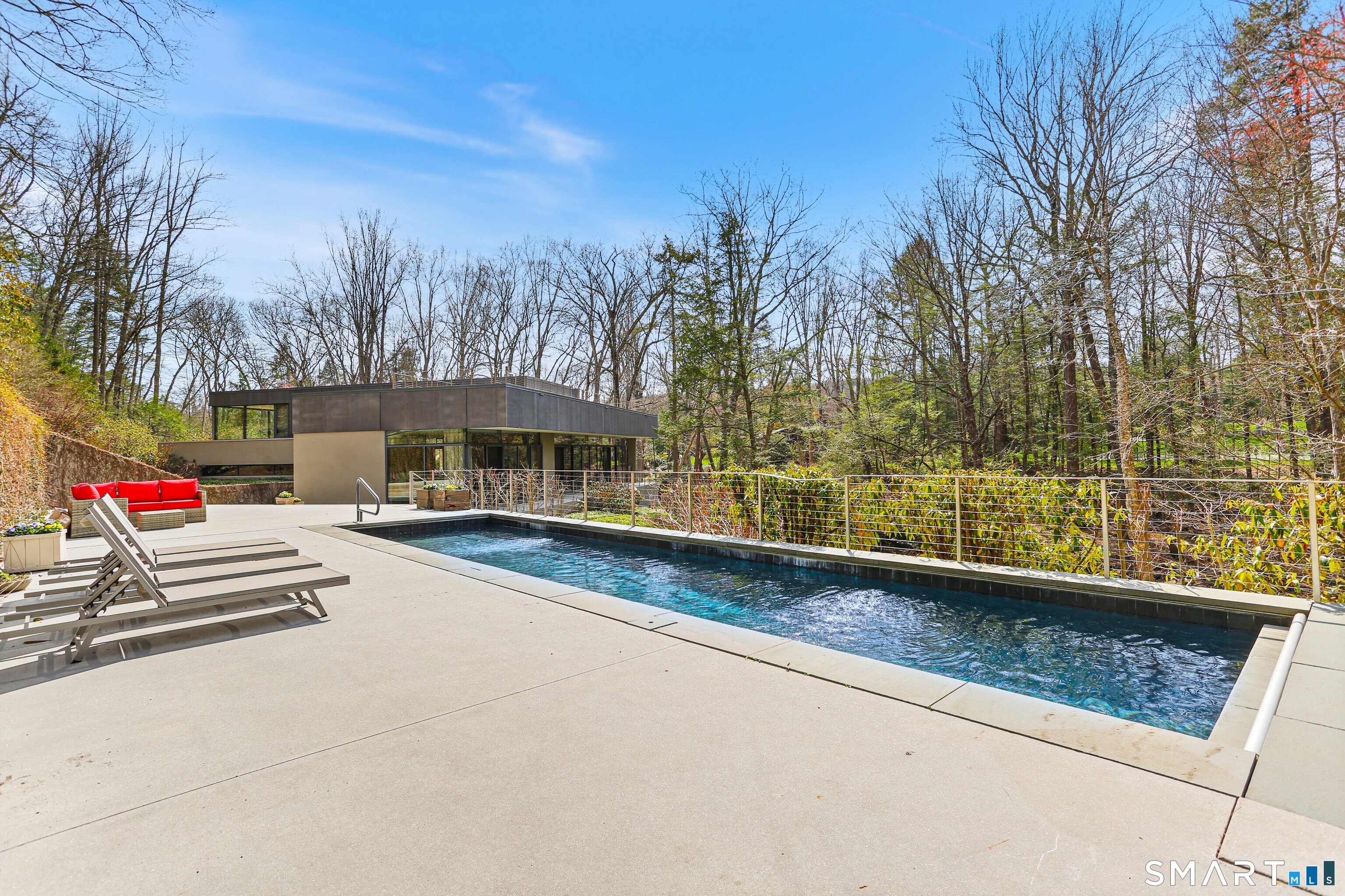 52 Valley Forge Road Weston, CT 06883 - Photo 32 of 38 swimming pool view with trees in front of it