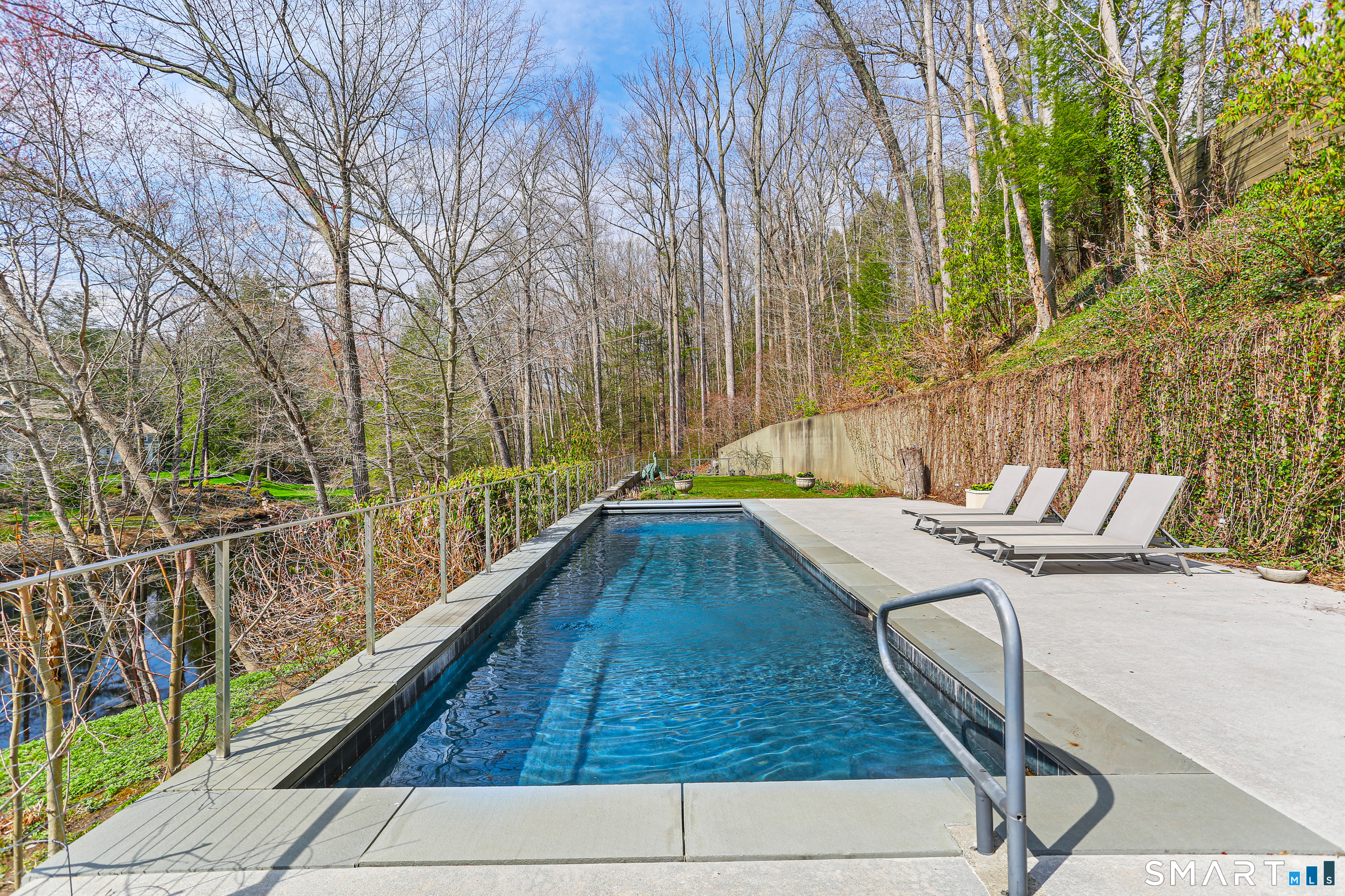 52 Valley Forge Road Weston, CT 06883 - Photo 33 of 38 a terrace with outdoor seating and trees