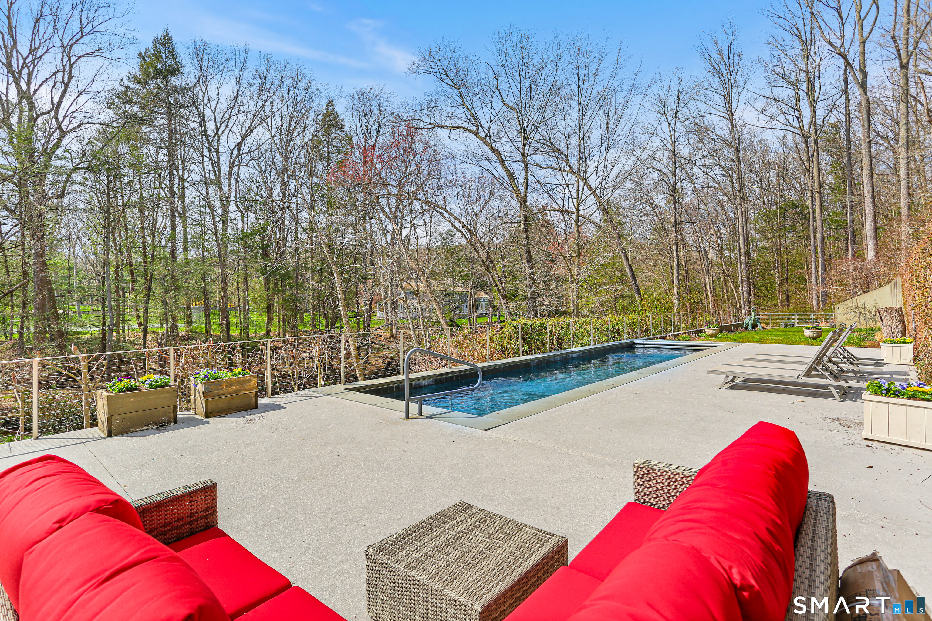 52 Valley Forge Road Weston, CT 06883 - Photo 34 of 38 a view of swimming pool with outdoor seating and city view