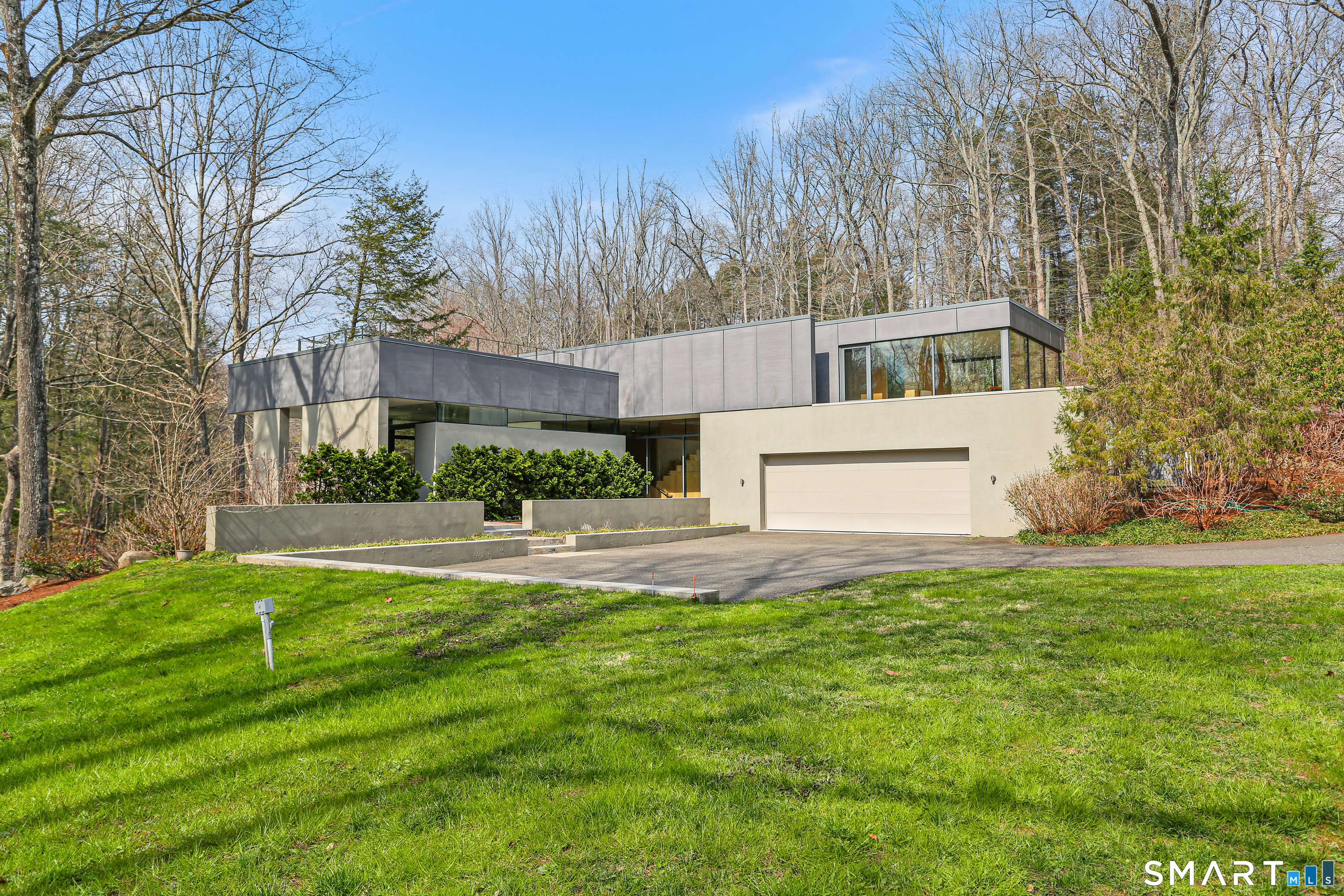 52 Valley Forge Road Weston, CT 06883 - Photo 35 of 38 a view of a house with a yard