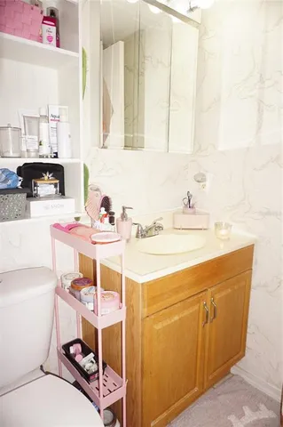 a chair and a table with a potted plant