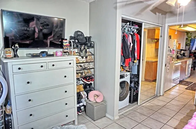 a white stove top oven sitting inside of a kitchen