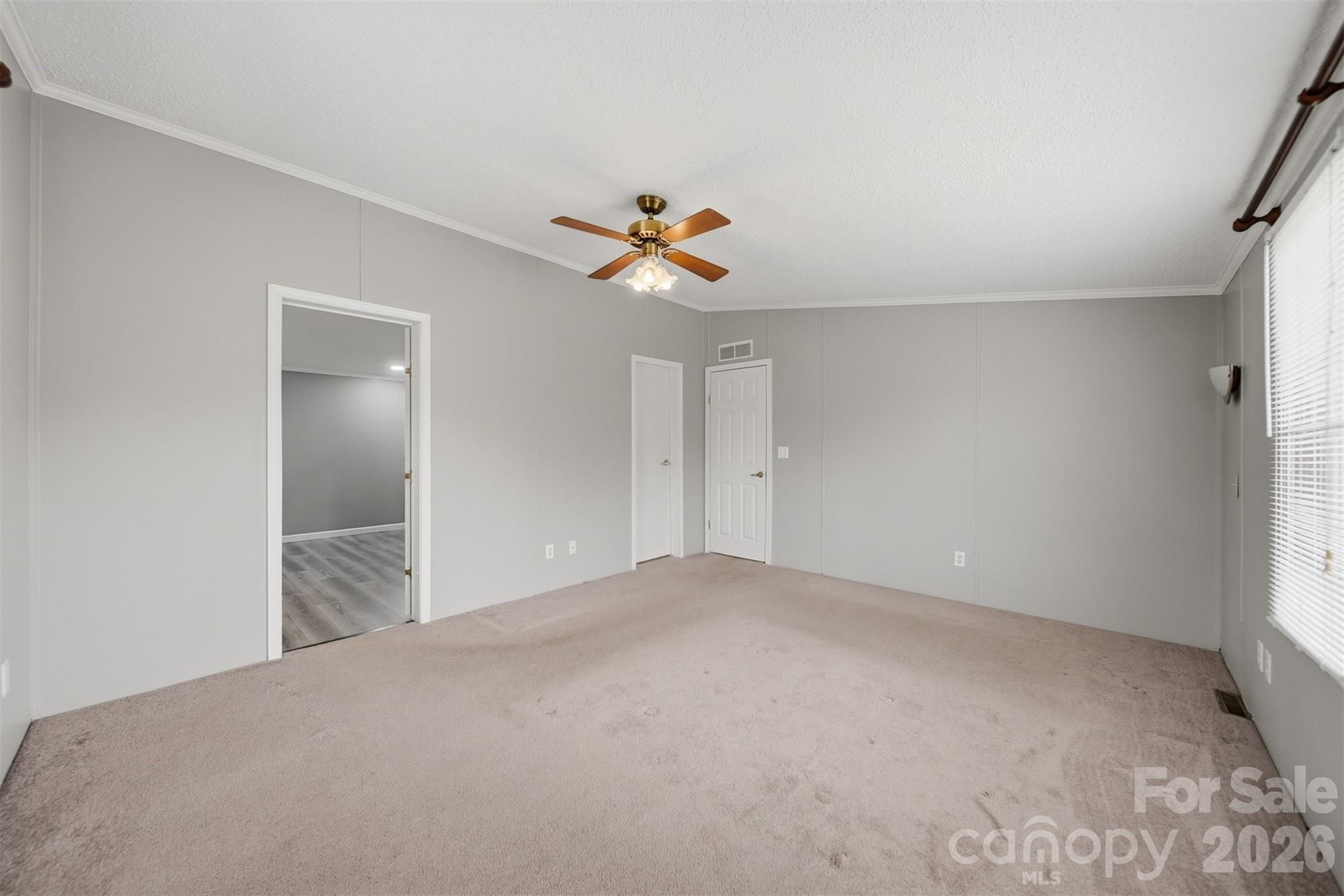 315 West McDowell Street Morganton, NC 28655 - Photo 21 of 48 wooden floor in an empty room with a window