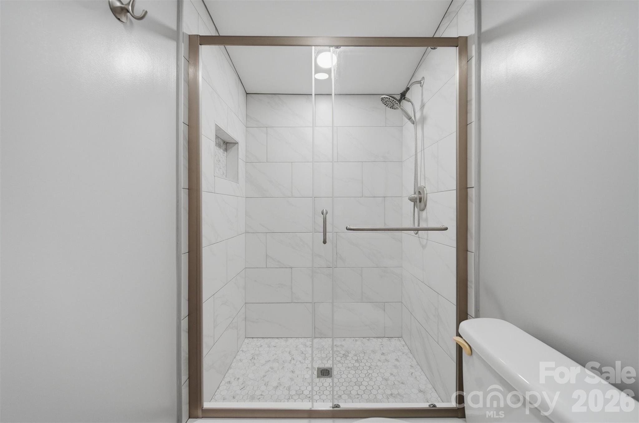 315 West McDowell Street Morganton, NC 28655 - Photo 34 of 48 a bathroom with a shower
