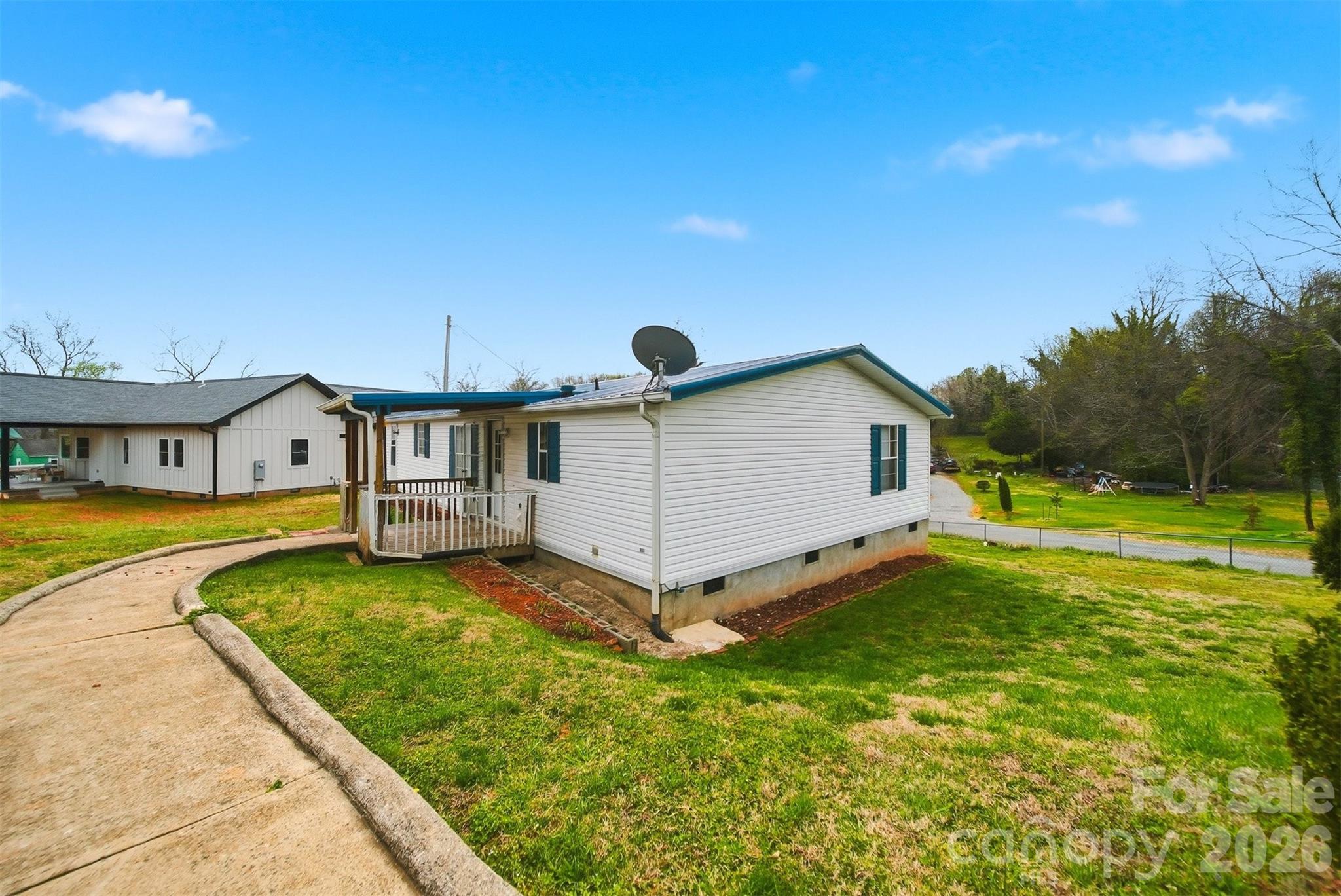 315 West McDowell Street Morganton, NC 28655 - Photo 37 of 48 a view of a house with a yard