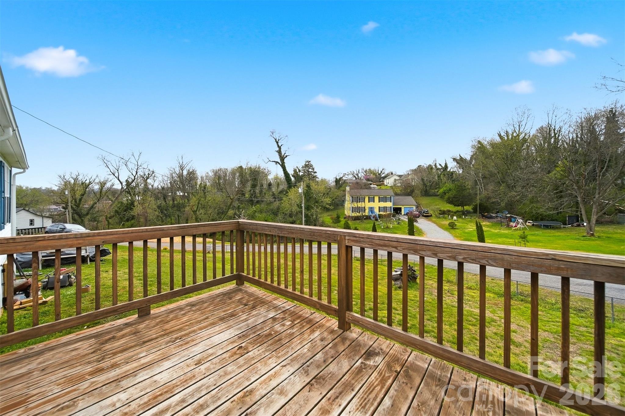 315 West McDowell Street Morganton, NC 28655 - Photo 39 of 48 a view of balcony with wooden floor and fence
