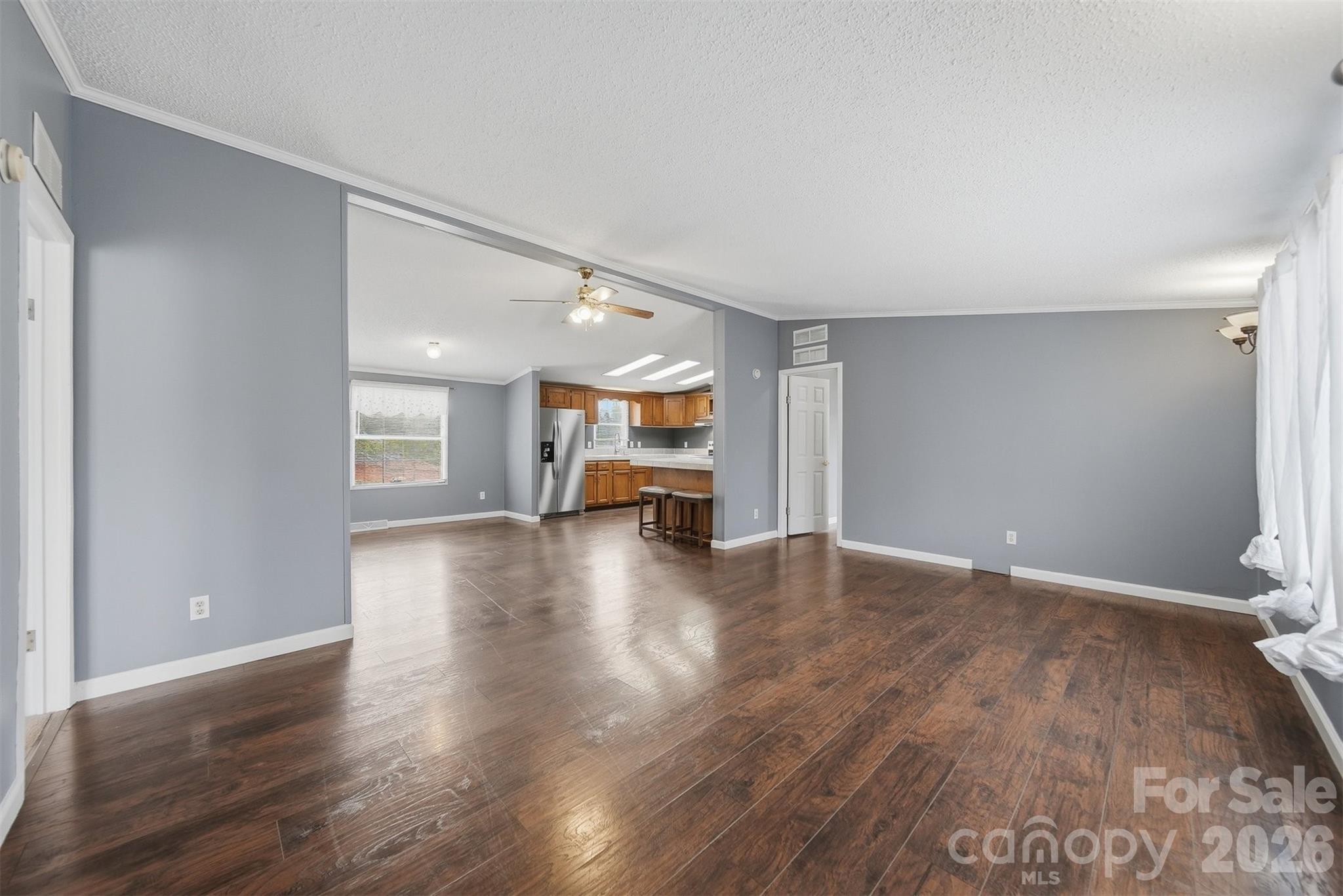 315 West McDowell Street Morganton, NC 28655 - Photo 4 of 48 a view of empty room with wooden floor