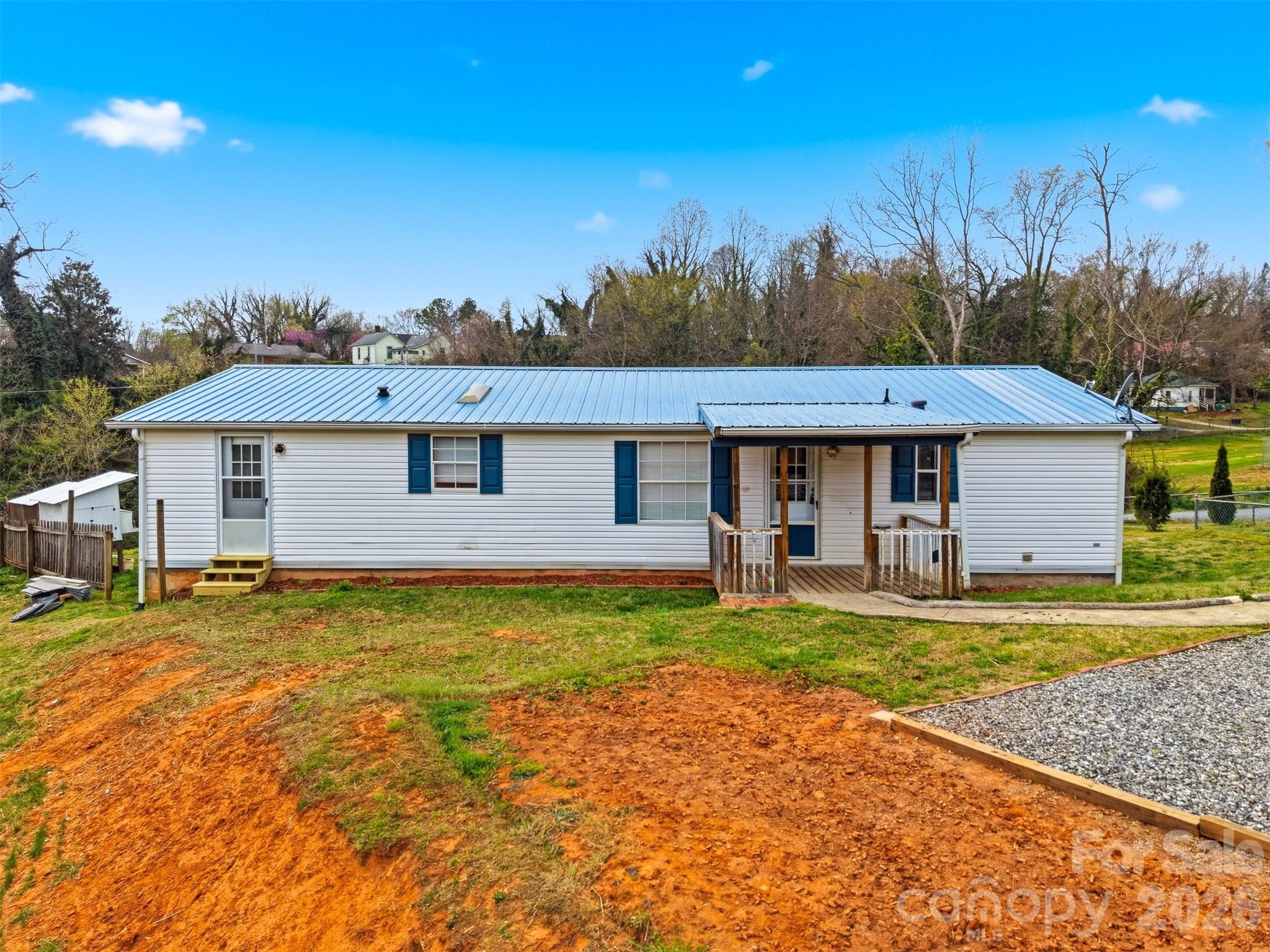 315 West McDowell Street Morganton, NC 28655 - Photo 41 of 48 a front view of a house with garden