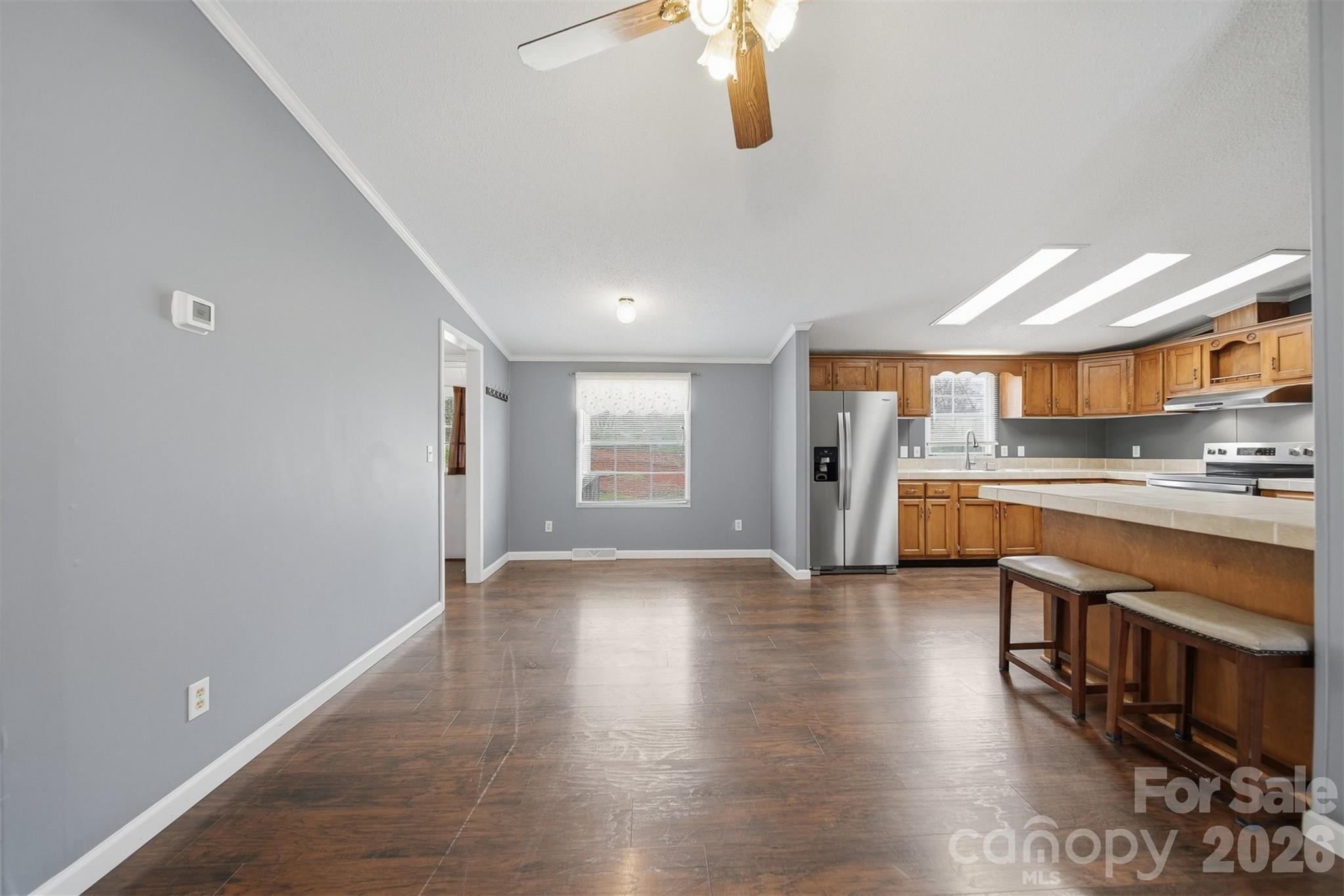 315 West McDowell Street Morganton, NC 28655 - Photo 9 of 48 a large kitchen with stainless steel appliances granite countertop a lot of counter space and wooden floor
