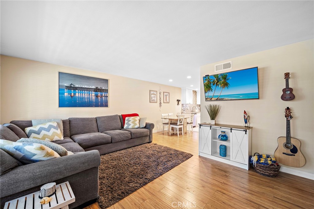2404 Niagara Way Costa Mesa, CA 92626 - Photo 3 of 19 a living room with furniture a rug and white walls