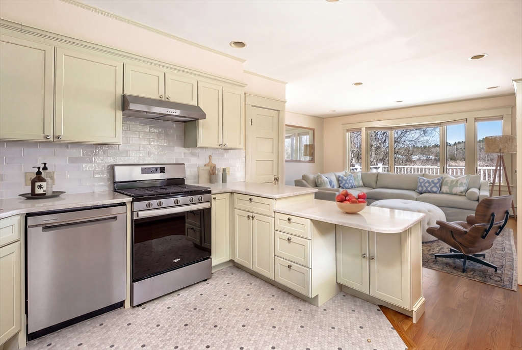 329 Front Street Marion, MA 02738 - Photo 24 of 42 a kitchen with a sink stove and cabinets