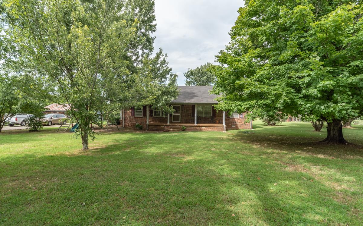 6246 Arno Road Franklin, TN 37064 - Photo 2 of 29 a view of an house with backyard space and garden