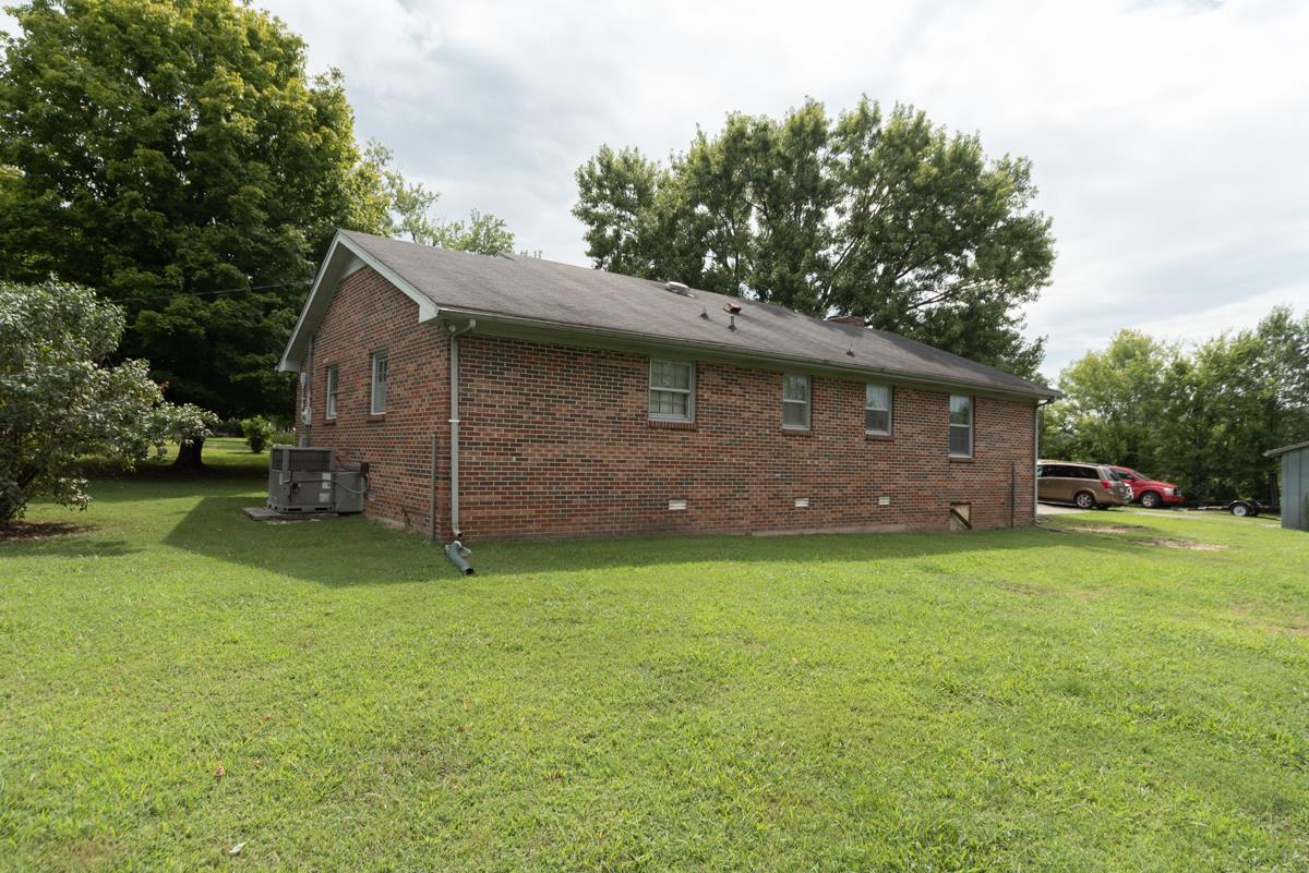 6246 Arno Road Franklin, TN 37064 - Photo 25 of 29 a view of a backyard with a garden