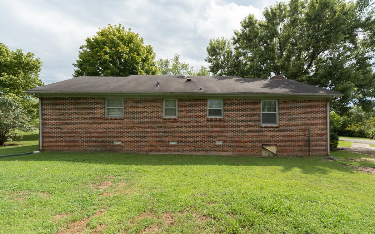6246 Arno Road Franklin, TN 37064 - Photo 26 of 29 a front view of a house with a garden