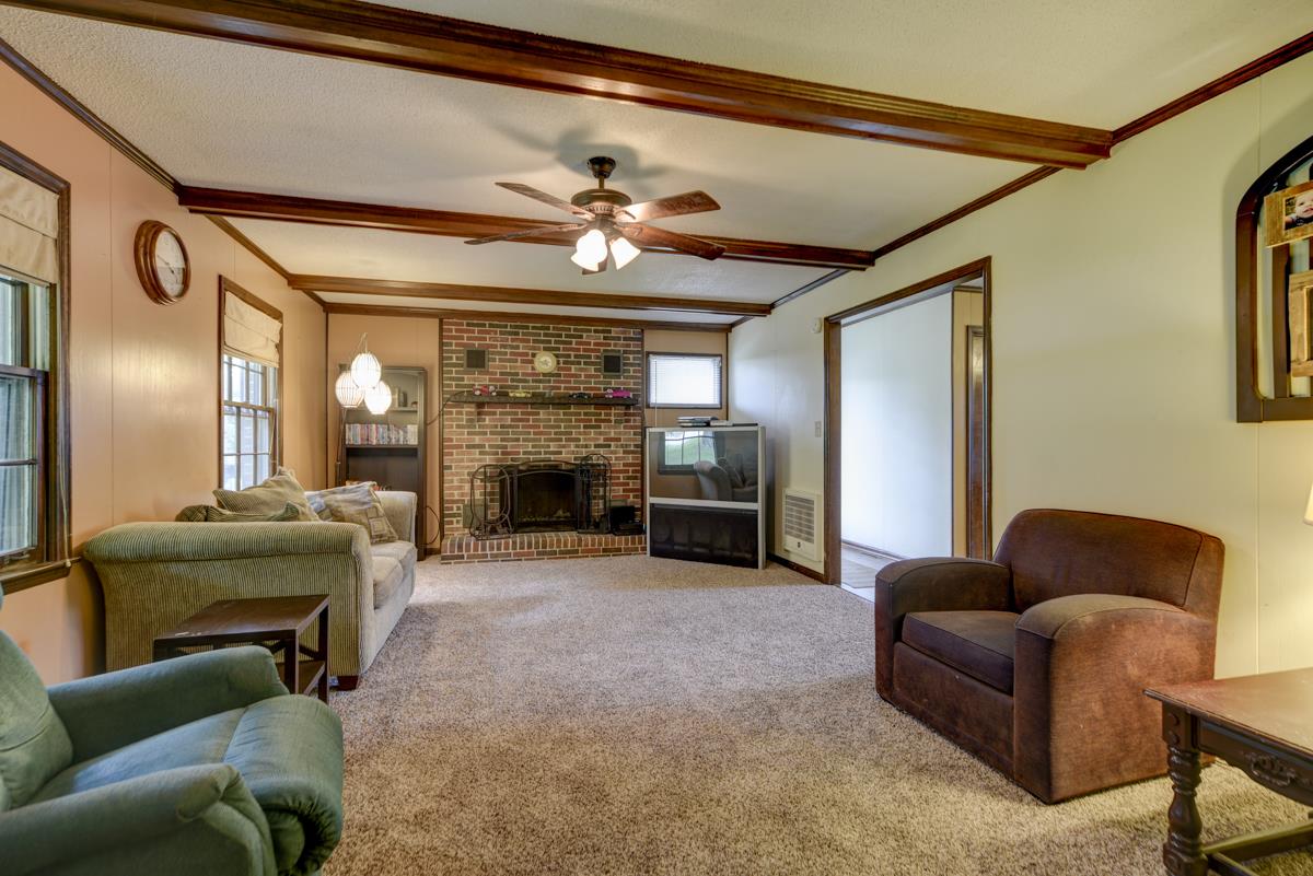 6246 Arno Road Franklin, TN 37064 - Photo 5 of 29 a living room with furniture and a fireplace