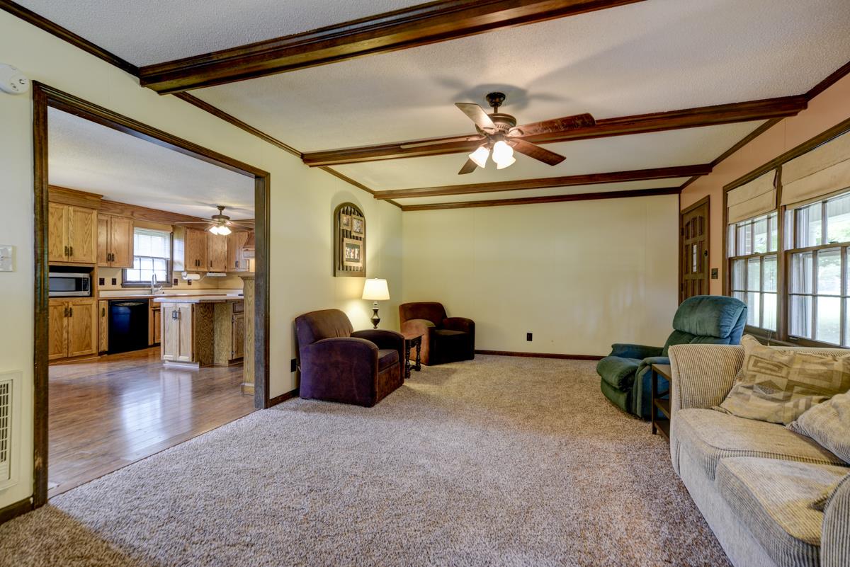 6246 Arno Road Franklin, TN 37064 - Photo 6 of 29 a living room with furniture and kitchen view