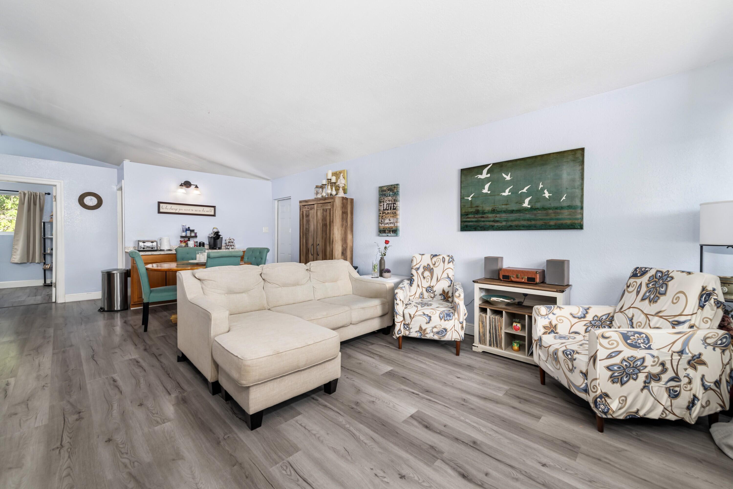 423 80th Street Marathon, FL 33050 - Photo 14 of 39 a living room with furniture and a flat screen tv
