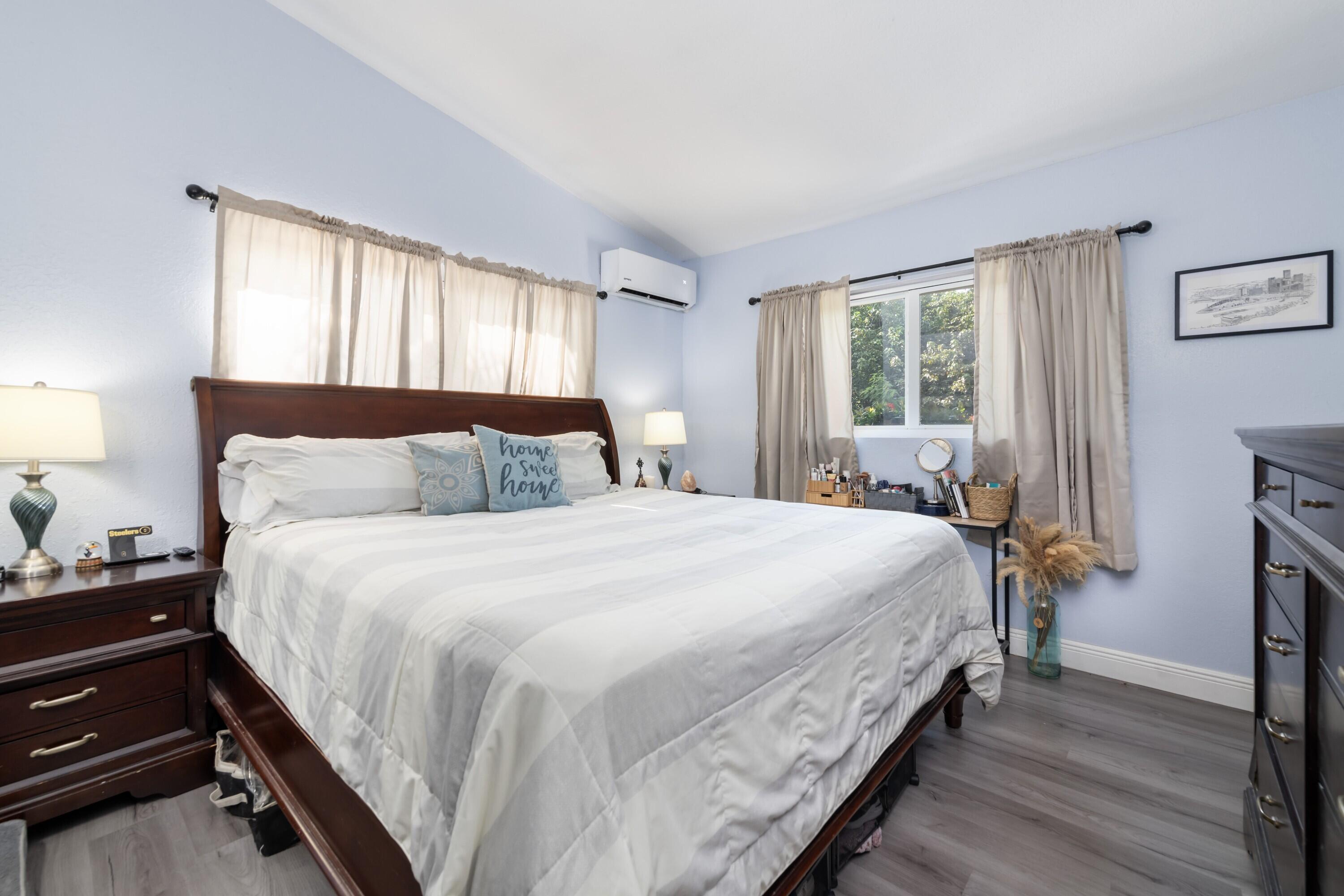 423 80th Street Marathon, FL 33050 - Photo 18 of 39 a bedroom with a bed and a window